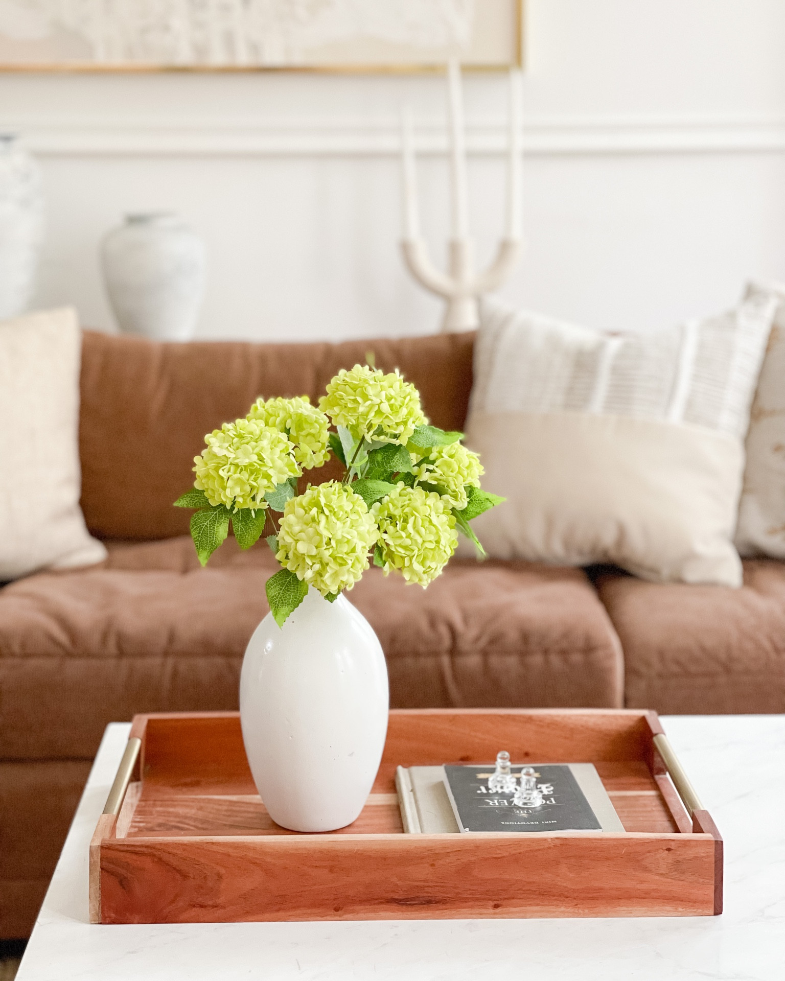 Faux hydrangeas, wood tray, candelabra, living room styling. 

#LTKunder50 #LTKhome #LTKFind