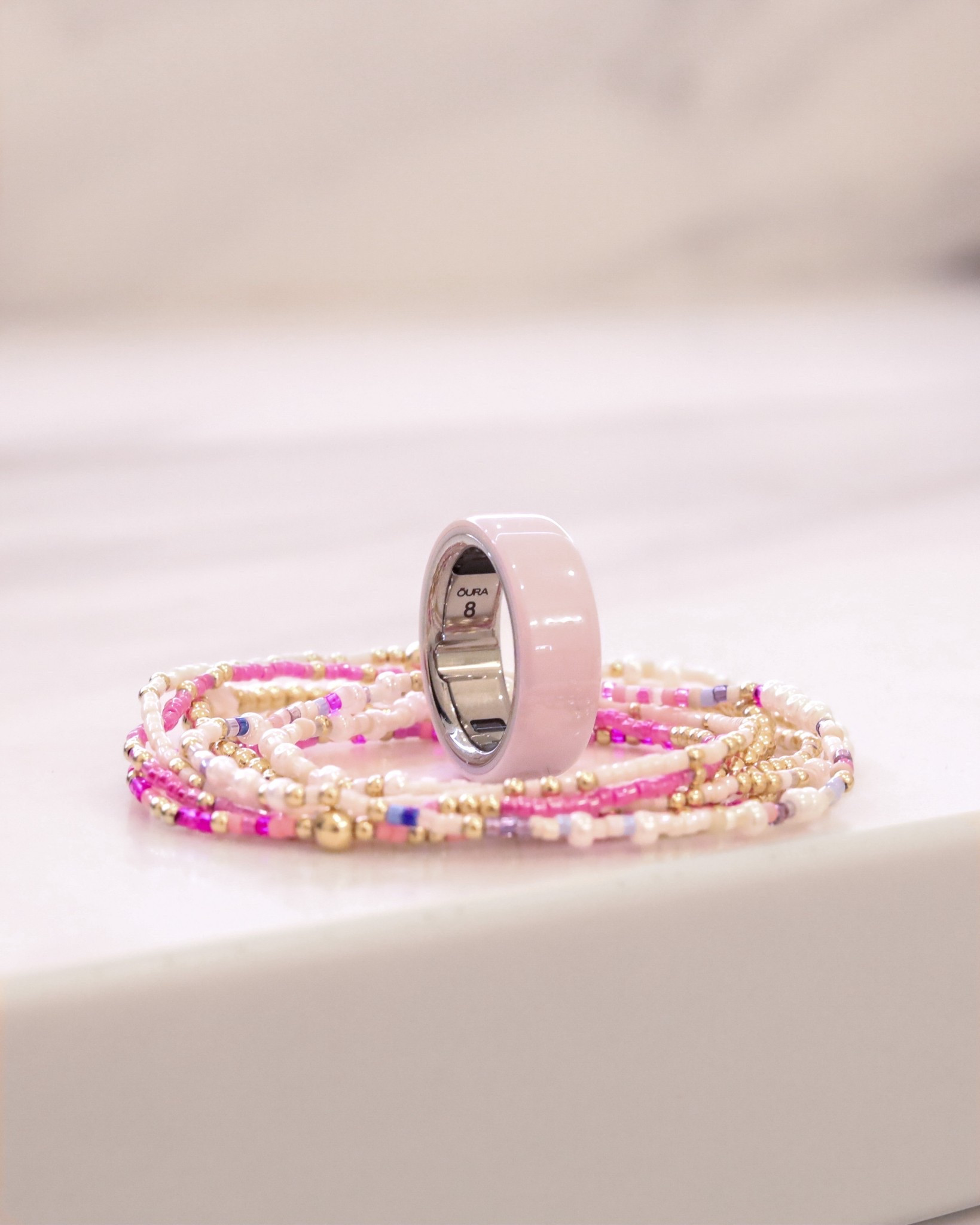 One of the most asked questions lately: “Do you love your Oura Ring?” and the answer is YES. 🤍 💍 

I’ve been looking at these for years and finally got one for my birthday this year… and I honestly wish I wouldn’t have waited so long.

I love having a simple, beautiful way to stay connected to my health every single day. It tracks my cycle using body temperature so I always know where I’m at, gives me a daily readiness score based on how I slept and recovered, and shows my total calories burned (both active and at rest) which helps me stay more mindful of what’s going in and out of my body.

Waking up to my sleep score has honestly changed my mornings. I can see how I actually rested, not just how I feel. It also measures heart rate, HRV, cardio health, stress levels, blood oxygen, and activity balance and after two weeks of consistent wear, I found out my cardio age is eight years younger than my actual age (I was nervous to find out and relieved to see my result😅).

One of my favorite parts? My sister and my friend Taylor both have one too, so we have a little “circle” where we can see each other’s stats which quickly turns into a very entertaining group text.🤣

Pro tip before you order: get the sizing kit first (you even get $10 off your ring when you get one), or try the sizers in person at places like Best Buy or Target. They definitely run small. I normally wear a 6.25 on my ring finger and my Oura Ring is an 8 and fits perfectly. 

What I love most is how it helps me notice patterns: my habits, recovery, movement, and overall wellness so I can keep improving little by little. I still wear and love my Apple Watch for workouts, calls, and messages, but this little ring is my quiet daily check-in with my health… and I’m so grateful for that balance.

If you’ve been curious, I’m linking mine here 🤍✨