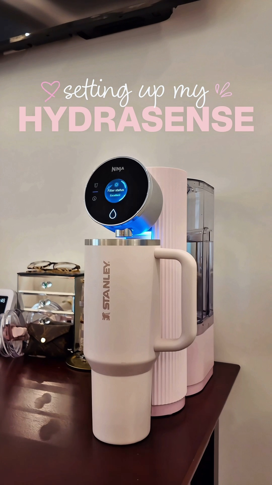New home must-have!💧💕 The Ninja HydraSense Intelligent Water Filtration System delivers fresh, filtered water on demand and filters out more than 80 contaminants, including chlorine, lead, mercury, and certain pharmaceuticals. With a huge 96-ounce reservoir, a built-in water-quality meter, and smart tracking that monitors your water usage and lets you know when it’s time to replace the filter, it makes staying hydrated so easy. No plumbing or installation required; just fill it, plug it in, and enjoy filtered water whenever you need it. And this Rosewater Pink? So me. 💁🏼‍♀️😂