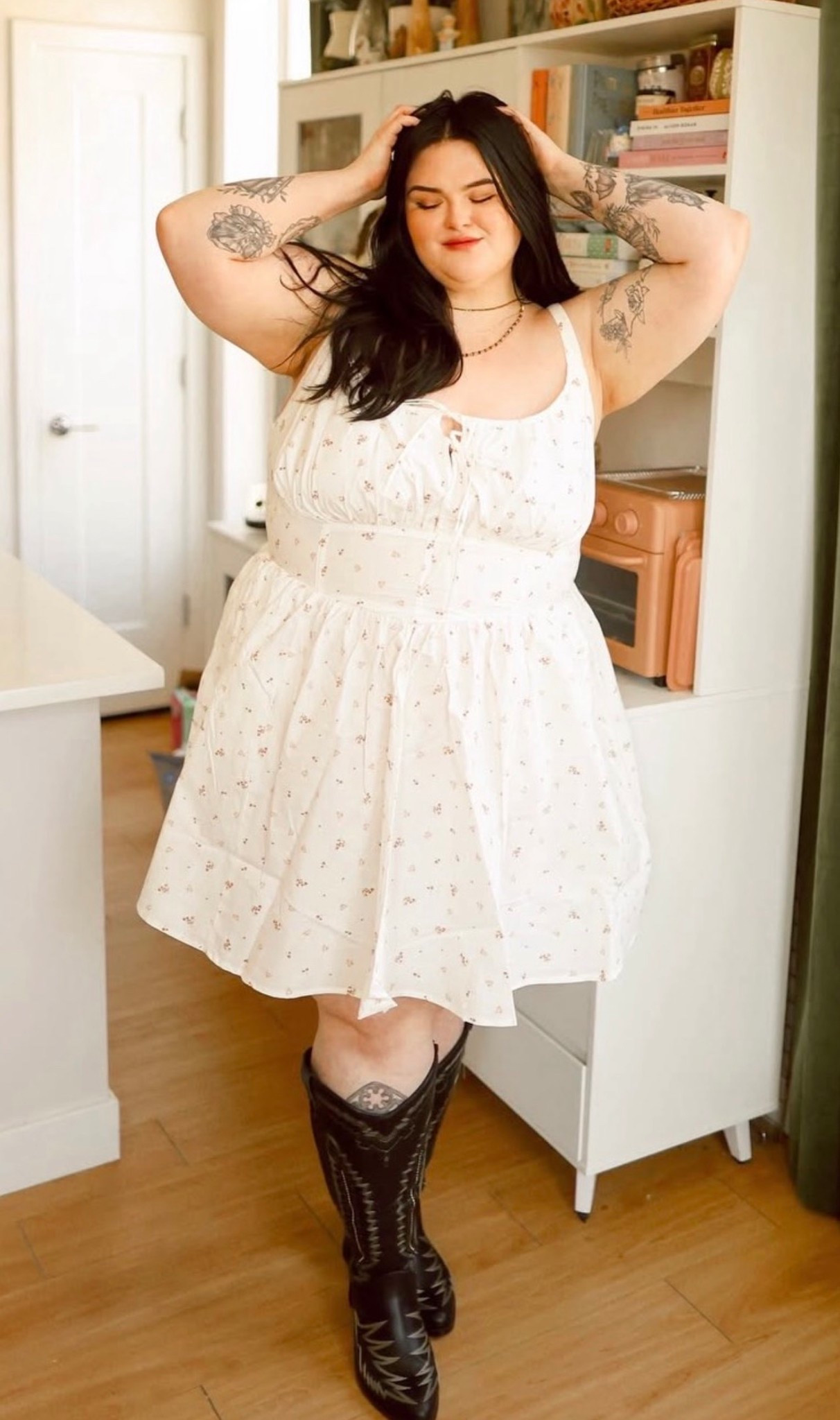 Plus size fashion finds! This @Torrid dress is BACK in stock from last year!! New colors and patterns. The perfect spring dress! Styled with cowboy boots! Perfect for the upcoming festival season and great for brides  

#LTKSaleAlert #LTKPlusSize #LTKootd