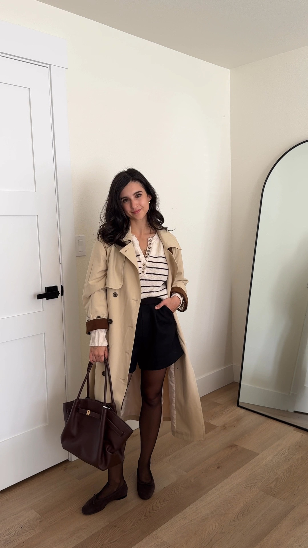 Linked a Sezane dupe for the sweater! Just note the quality is not the same! The Sezane version has lasted me nearly 4 years (washed and dried, still perfect) 
Sezane shorts wearing the smaller size. They are wool and very warm and thick! Linked the Goelia version I also own which are also wool but the fabric is more sleek and not as heavy but SO lovely too. Trench I’m wearing XXS 

#LTKSaleAlert #LTKFindsUnder100 #LTKPetite