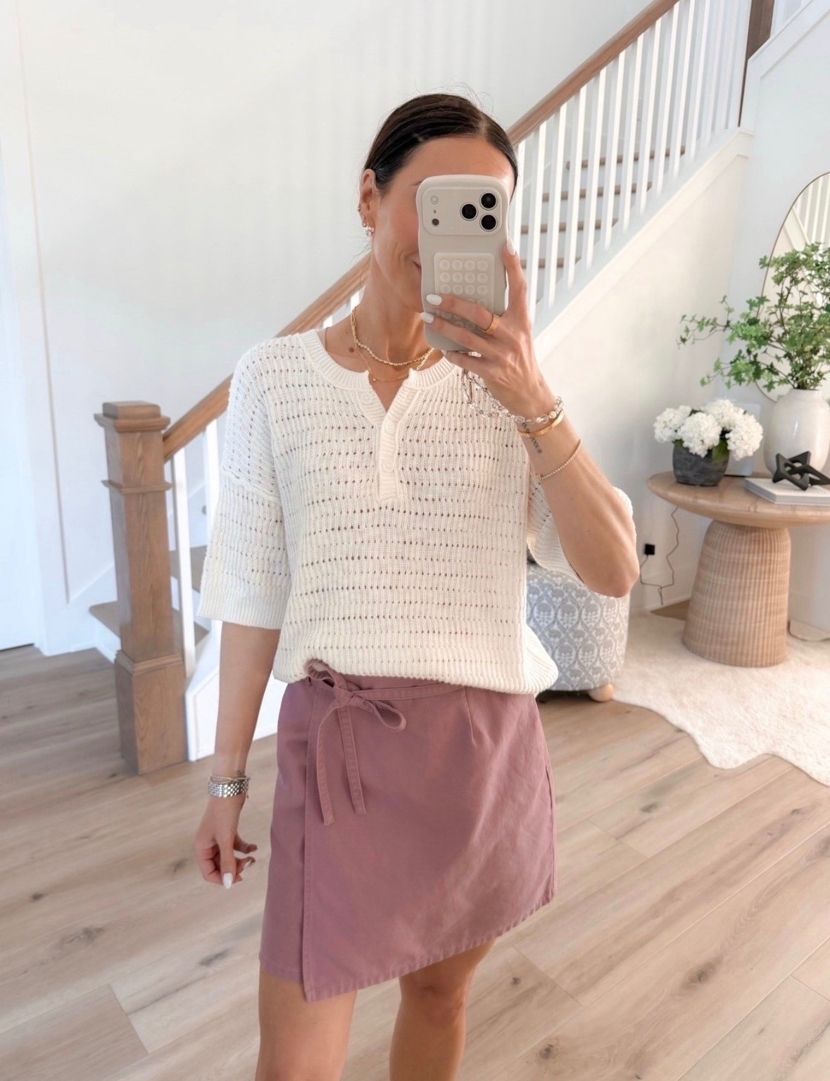 this combo is so good for spring. the lightweight knit is breathable but still feels put together, and this skirt is the perfect easy throw on piece. love the color pairing, it feels fresh without trying too hard

spring outfit, casual chic, everyday style, lightweight sweater, mini skirt outfit, neutral style, effortless outfits, annabrstyle 

#LTKSeasonal #LTKootd #LTKTravel