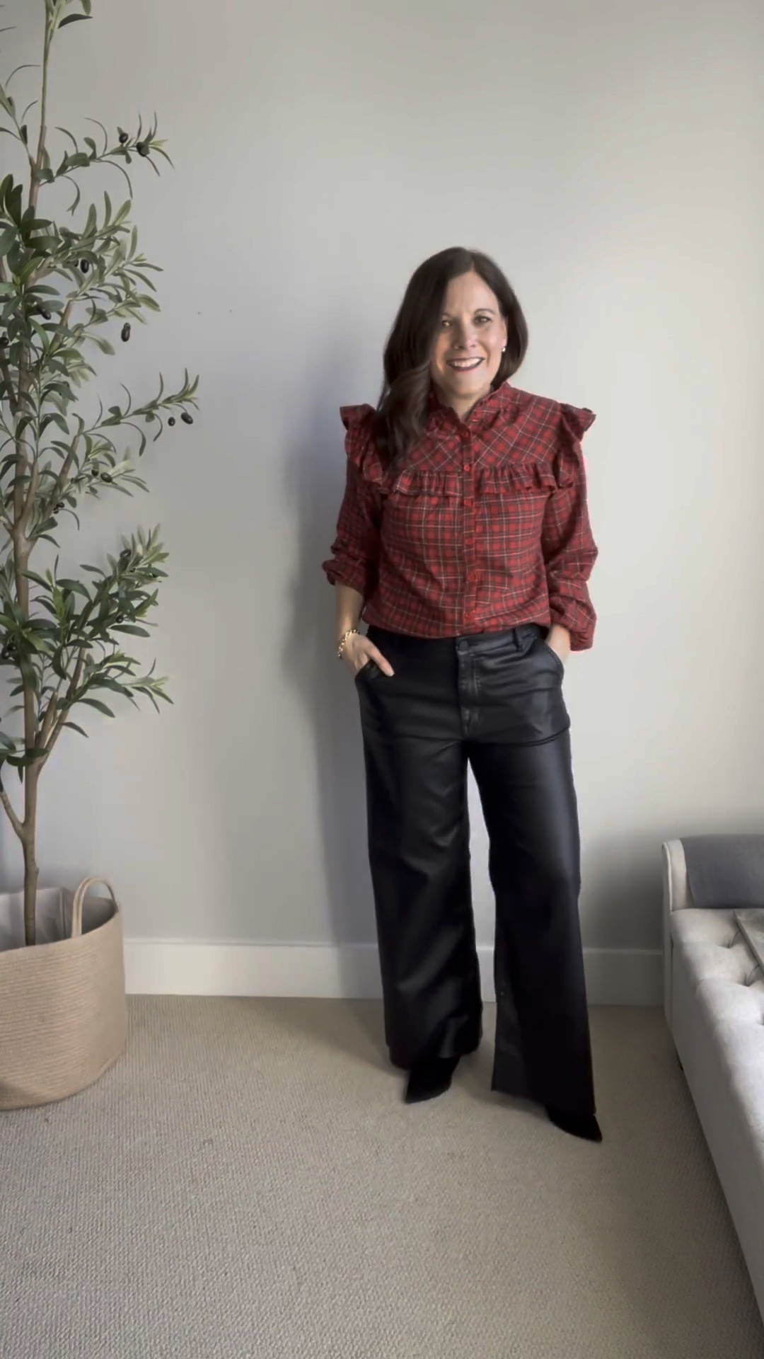 Here I’m pairing this classic red plaid Christmas blouse from Social Threads (fits TTS) with my Kut From the Kloth coated wide leg jeans (similar linked). These also run true to size and give the blouse a more edgy dressed up feel.

#LTKOver40 #LTKMidsize #LTKHoliday