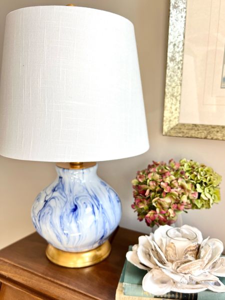 This blue and white marbleized lamp is the perfect accent lamp for a piano, side table, nightstand, or cozy nook. blue and white decor, small blue and white lamp, oyster shell votive holder. 

#LTKhome #LTKstyletip #LTKunder100