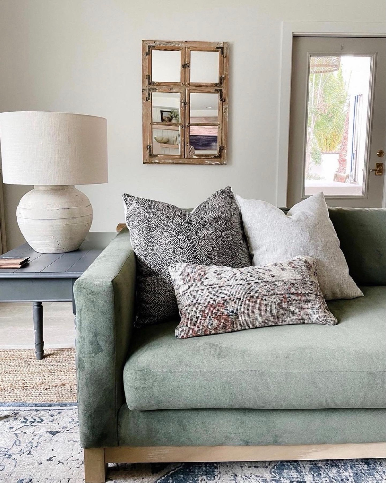 We love this velvet green sofa and lamp! We also always love adding a little vintage to every space.

#LTKMostLoved #LTKhome