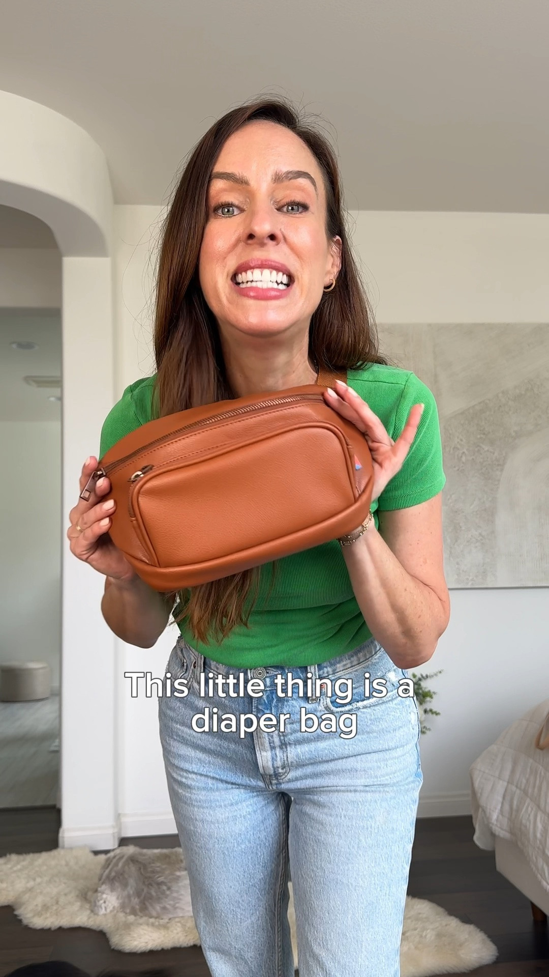 Use code SYDNE20 for 20% off through 6/30

Can you believe this stylish belt bag is actually a diaper bag?! It’s tiny, portable, super cute and fits SO much.

I’ve used it practically every day for the last 15 months. I wear this chic fanny pack over my shoulder, hook it on my stroller and toss it in larger totes so I always have my mom essentials with me.

💛 Some favorite features:
• Detachable changing pad, making diaper changes on the go so much easier
• Waterproof pocket for wet wipes, fits up to 20
• Super lightweight, a major bonus now that my son is a toddler who demands to be carried non-stop!


#LTKItBag #LTKBump #LTKBaby