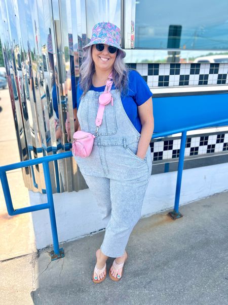 ✨SIZING•PRODUCT INFO✨
⏺ Railroad Stripe Denim Overalls, nice stretch, Junior’s XXXL ( TTS) @walmartfashion 
⏺ Pastel “Groovy” Bucket Hat @walmartfashion 
⏺ Wide Strap Thong Flip Flops - run small - go up one from your normal size @walmartfashion 
⏺ Cobalt Blue Basic Tee - L - TTS @oldnavy
⏺ Linked similar bum bag from @walmartfashion (which is where mine is from, it’s just older)
⏺ Retro Round Sunglasses 

Overalls, denim, jean, denim overalls, stripes, striped, cropped, pink bag, bum bag, fanny pack, sparkle, 70’s, retro, bucket hat, hat, blue top, basic top, flip flops, spring, summer, funky, fun

#walmart #walmartfashion #walmartstyle walmart finds, walmart outfit, walmart look  #overalls #overallsoutfit #overallsoutfitinspo #overallsoutfitinspiration #overallslook #summeroveralls 
#hat #hats #beanie #beanies #hatoutfit #beanieoutfit #hatoutfitinspo #beanieoutfitinspo #hatlook #beanielook #hatstyle #beaniestyle #hatfashion #beaniefashion #baseball #baseballhat #baseballcap #cap #trucker #truckerhat #truckercap  
#sandals #springsandals #summersandals #springshoes #summershoes #flipflops #slides #summerslides #springslides #slidesandals #blue #cobaltblue #blueoutfit #blueoutfitinspo #blueshirt #blueoutfitinspiration #outfitwithblue #bluelook 
#retro #vintage #vibe retro, retro find, retro finds, retro style, retro fashion, retro look, retro vibe, retro outfit, retro outfit inspo, retro inspo, retro outfit inspiration, vintage find, vintage finds, vintage vibe, vintage style, vintage look, vintage inspiration, vintage outfit, vintage outfit inspo, vintage inspo, vintage outfit inspiration, 50’s, 60’s, 70’s, 80’s, 90’s, throwback style, throwback fashion 
#under30 #under40 #under50 #under60 #under75 #under100
#affordable #budget #inexpensive #size14 #size16 #size12 #medium #large #extralarge #xl #curvy #midsize #pear #pearshape #pearshaped
budget fashion, affordable fashion, budget style, affordable style, curvy style, curvy fashion, midsize style, midsize fashion


#LTKFindsUnder50 #LTKxWalmart #LTKStyleTip
