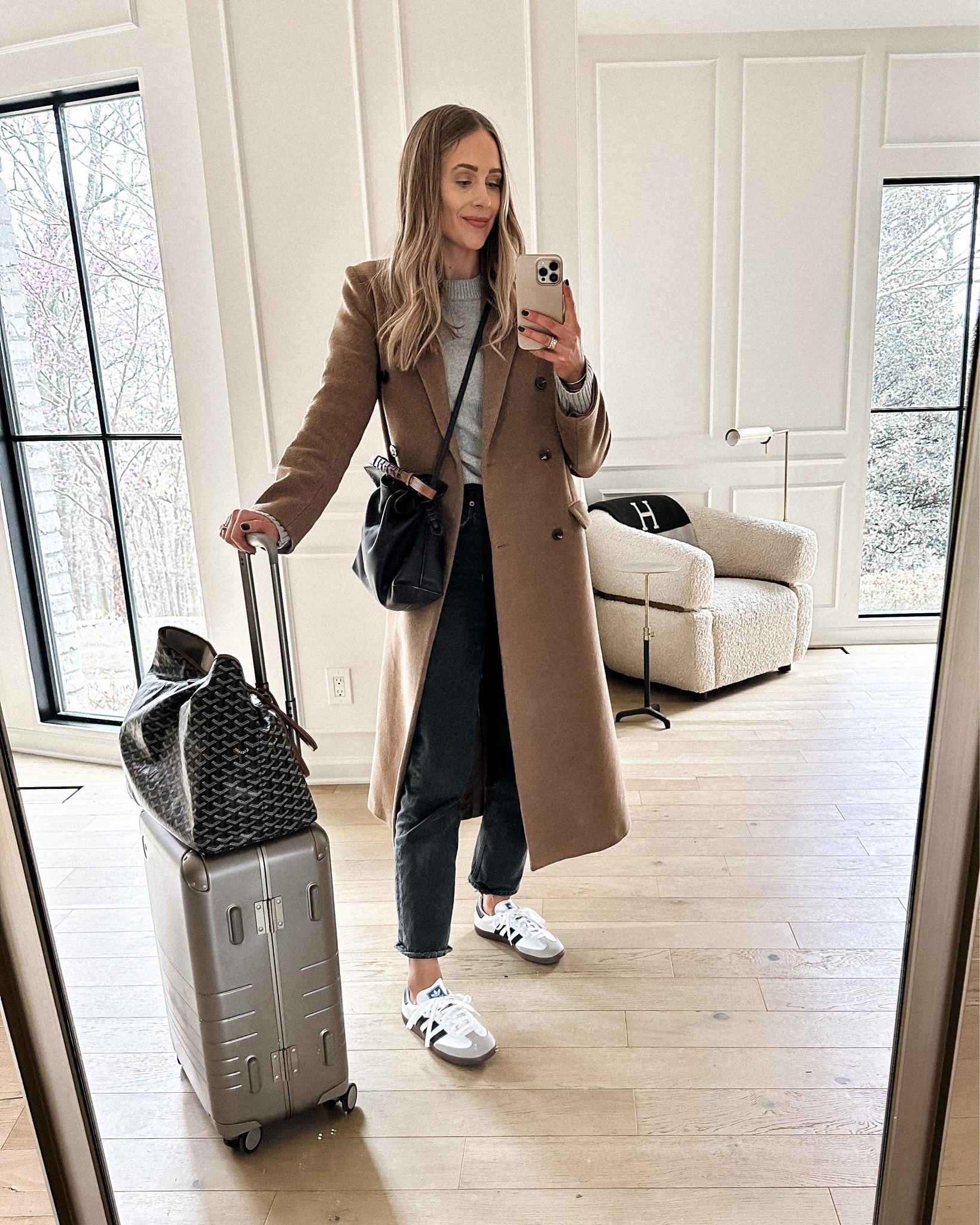 Fashion Jackson wearing camel coat (small) grey sweater (JACKSON15 discount code) AGOLDE jeans, samba sneakers, travel outfit, Goyard bag #fashionjackson #travel #sneakers 

#LTKshoecrush #LTKstyletip #LTKtravel