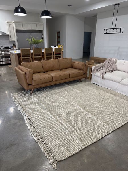 Loving this new jute rug! Brown couch is from article 

Livingroom decor, livingroom rug, leather couch, cloud couch dupe, world market brynn couch, target barstools, kitchen barstools 

#LTKfamily #LTKhome