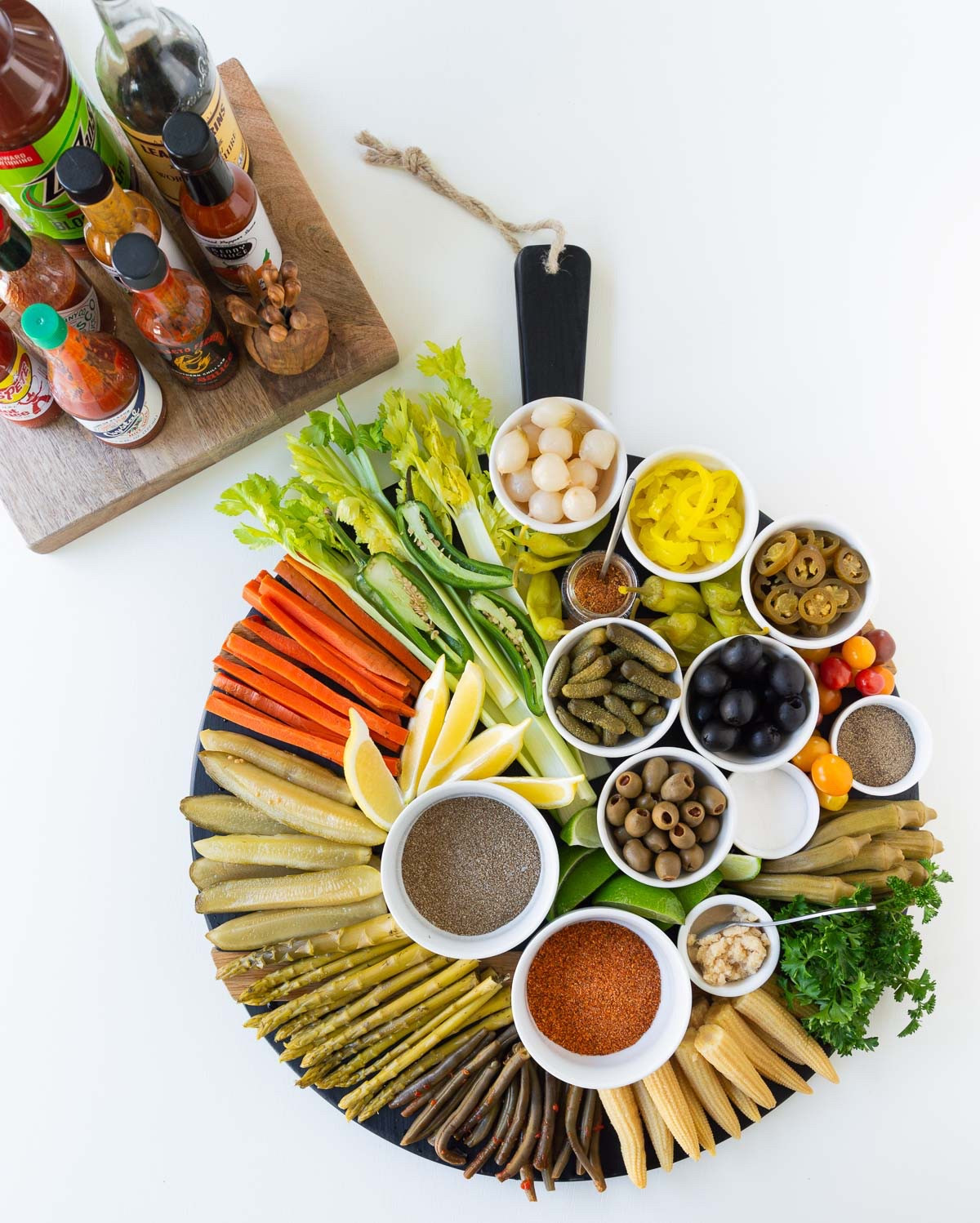 My latest take on a loaded Bloody Mary bar is this Bloody Mary BARcuterie board, with all of the garnishes, add-ins and build-your-own customizations. party food Charcuterie board cheese board snack board pool party brunch food grazing board#LTKStyleTip #LTKParties

#LTKHome