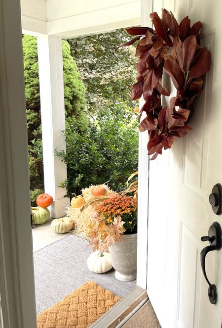 Something about a Fall front porch.
fall porch/fall decor/Halloween decor/door wreath/faux pumpkins/door mat

#LTKfindsunder50 #LTKSeasonal #LTKHalloween