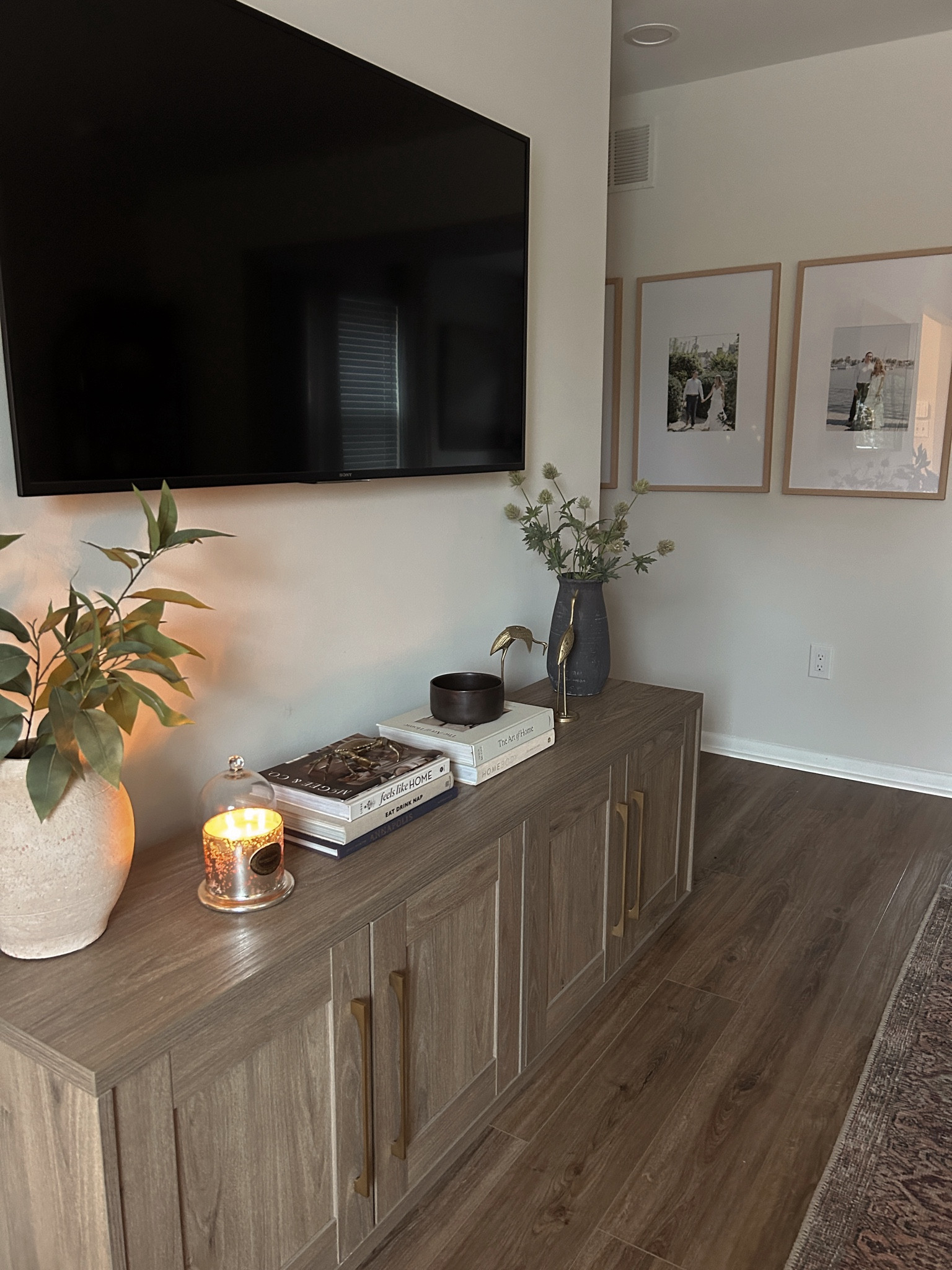 Living room decor. Gallery frames are 20 x 30. Brass figures are from a local vintage store.

#LTKSeasonal #LTKHome #LTKFallSale