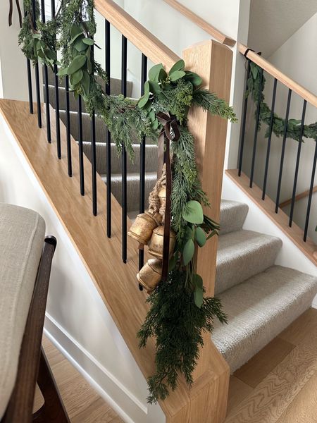 Simple / minimal style staircase garland 🎄

Used 1 cedar garland and cut up the eucalyptus one with a wire cutter to add to it! Added one cedar stem to the bottom of the left side since it’s a little longer than the right side. 

Secure garland to stairs with Velcro ties for damage free hanging! 

#LTKparties #LTKHoliday #LTKhome