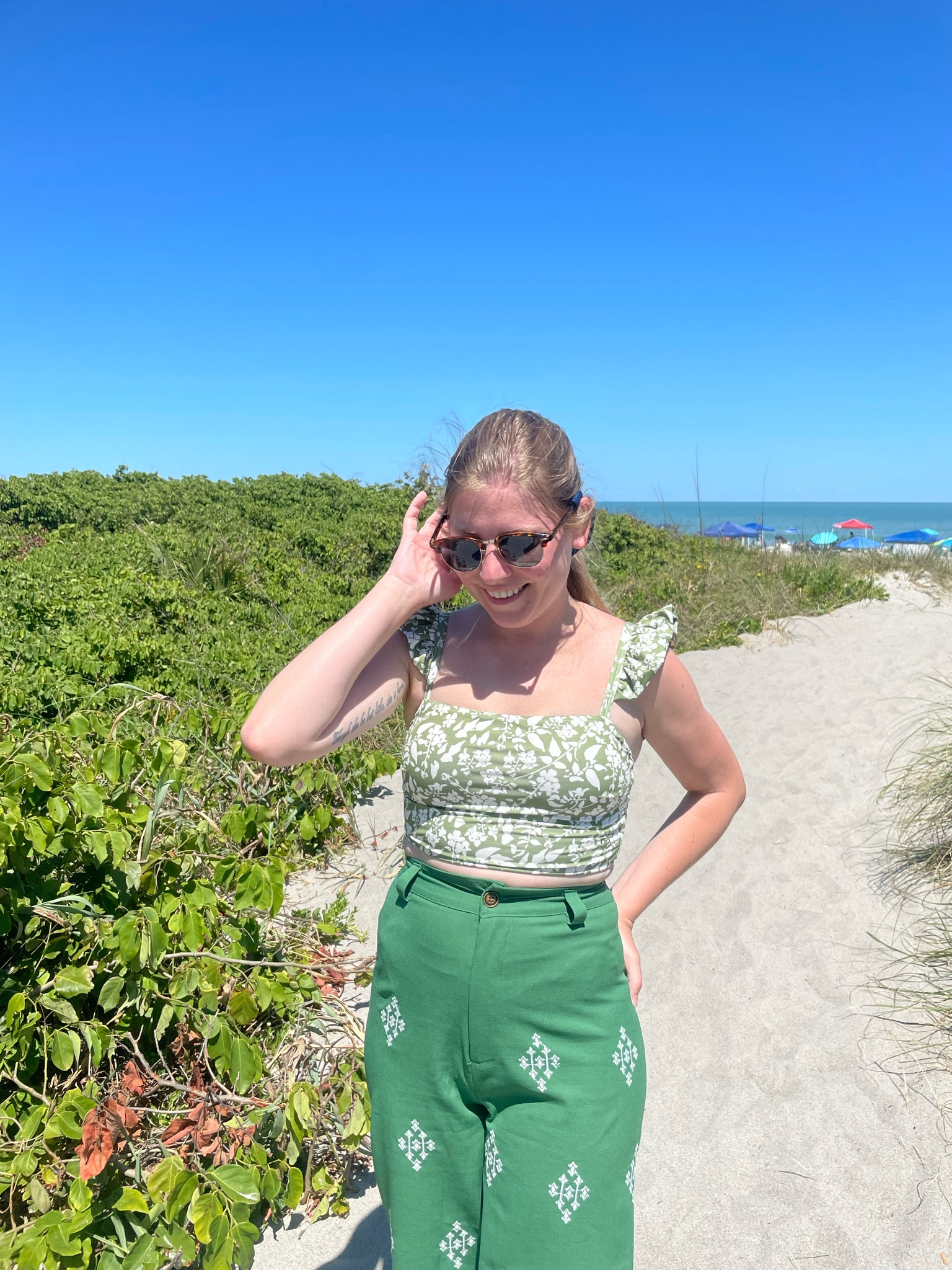 Save 10% when you use code SPRINGDANIELLE on your order  Ruffle sleeve sage green floral swim top  

#LTKswim