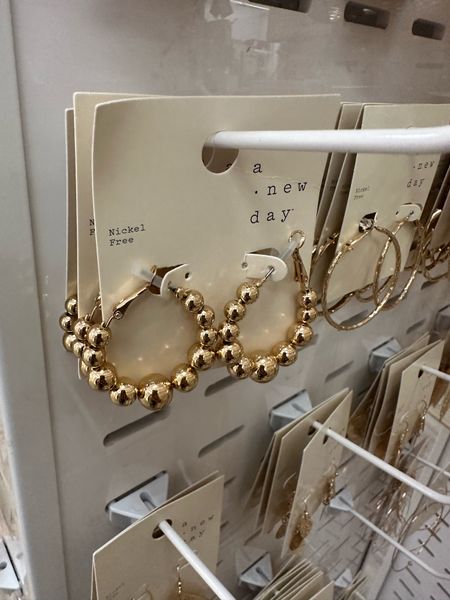 Cute Target finds: ball hoop earrings 

#LTKparties #LTKfindsunder50 #LTKU