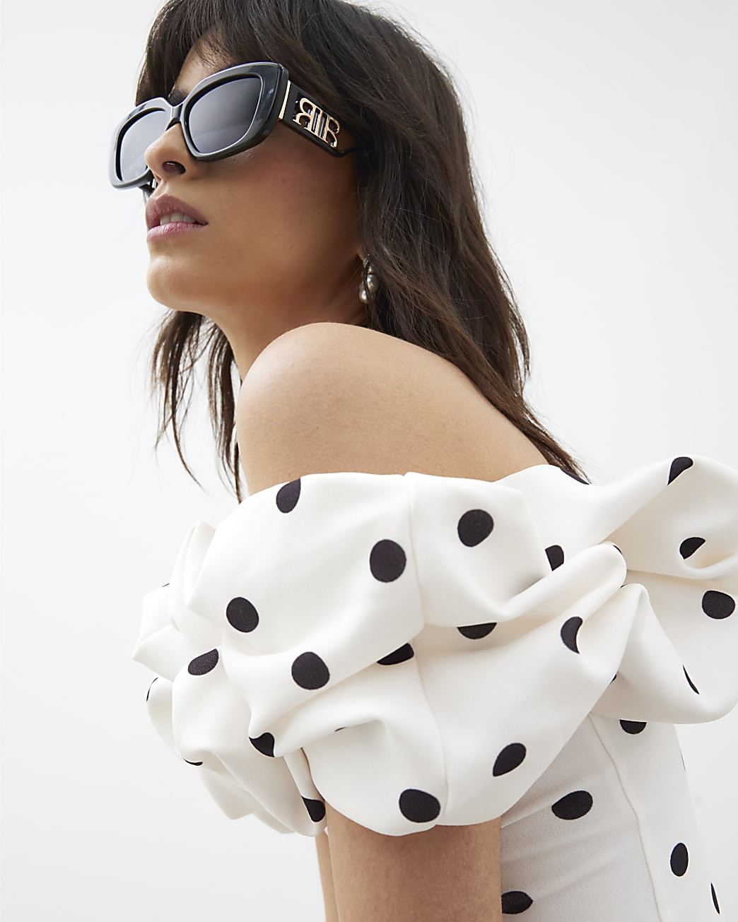 Cream Spot Print Ruffle Bardot Top | River Island UK & IE