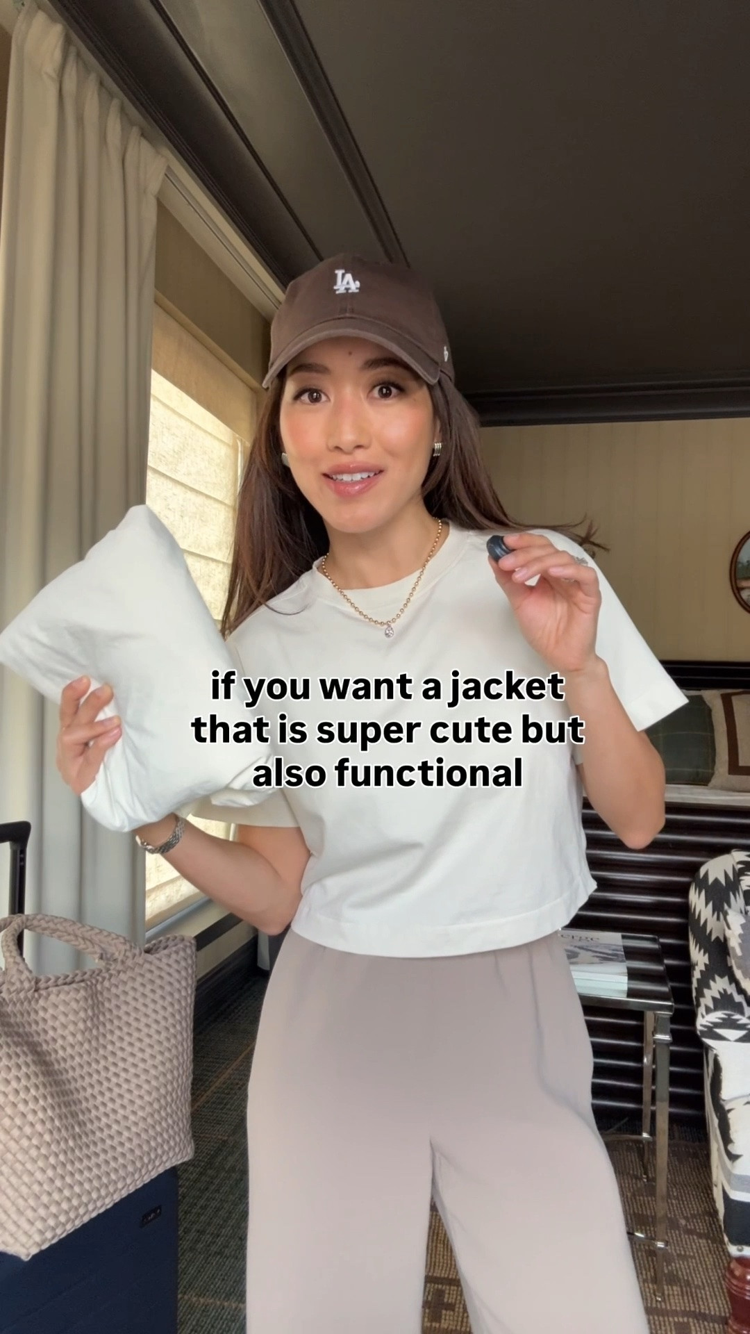 Sizing info below!
• Effortless Jacket in Classic Fit size 2 (size up. I'm usually xxs in other brands) water resistant with hood. 
•The Evolve Fit version of the jacket also linked is looser and TTS 
• Aritzia pants 2XS, hemmed. Their Short is still long on me, so I just got regular length and hemmed. Elastic waist, wrinkle resistant, drapey fabric . 
• lululemon Crop T-Shirt xxxs ivory, but this is TTS so I could’ve done xxs. 
• NB sneaker Kids 4, fits like women’s 6 (I could've done kids 3.5 since these are roomy). In their womens I'm a size 5 
• 47 brand hat 
• Naghedi medium tote in cashmere
• Away bigger flex carry-on suitcase
• liliclaspe necklace in 2 tone 

Travel outfit, airport style, petite friendly mom style, 2026 spring looks

#LTKTravel #LTKPetite #LTKootd