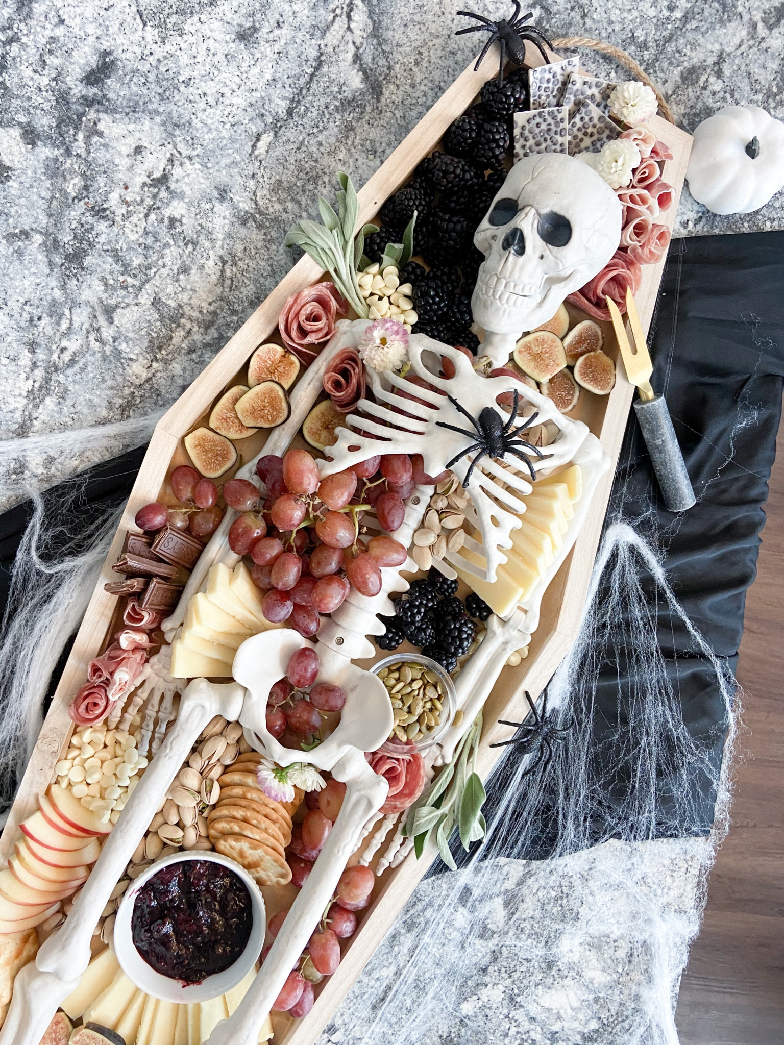 Spooky skeleton Halloween charcuterie board ! ☠️ 

#charcuterie #halloween #halloweenparty 

#LTKHalloween #LTKSeasonal #LTKfamily