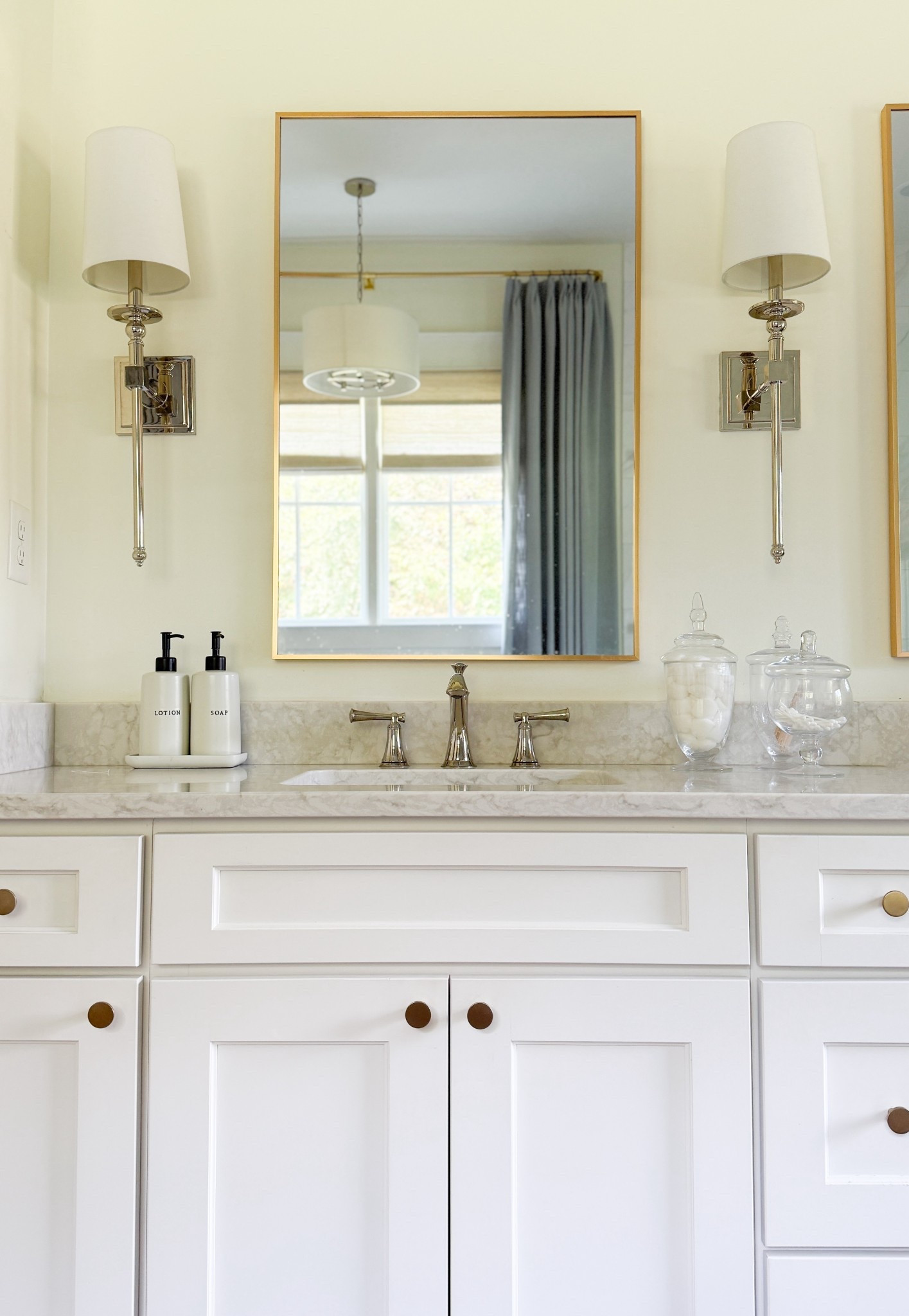 Light & airy primary bathroom views ✨ We mixed metals with warm polished nickel fixtures and touches of brass, paired with a classic white vanity in a full overlay cabinet style. The neutral quartz countertop adds just the right amount of movement while keeping the space fresh and timeless.


#LTKHome