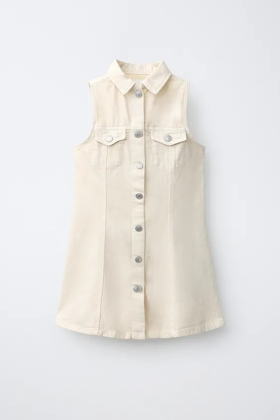 Denim dress with shirt collar and sleeveless design. Front snap button closure. Patch pockets wit... | Zara US