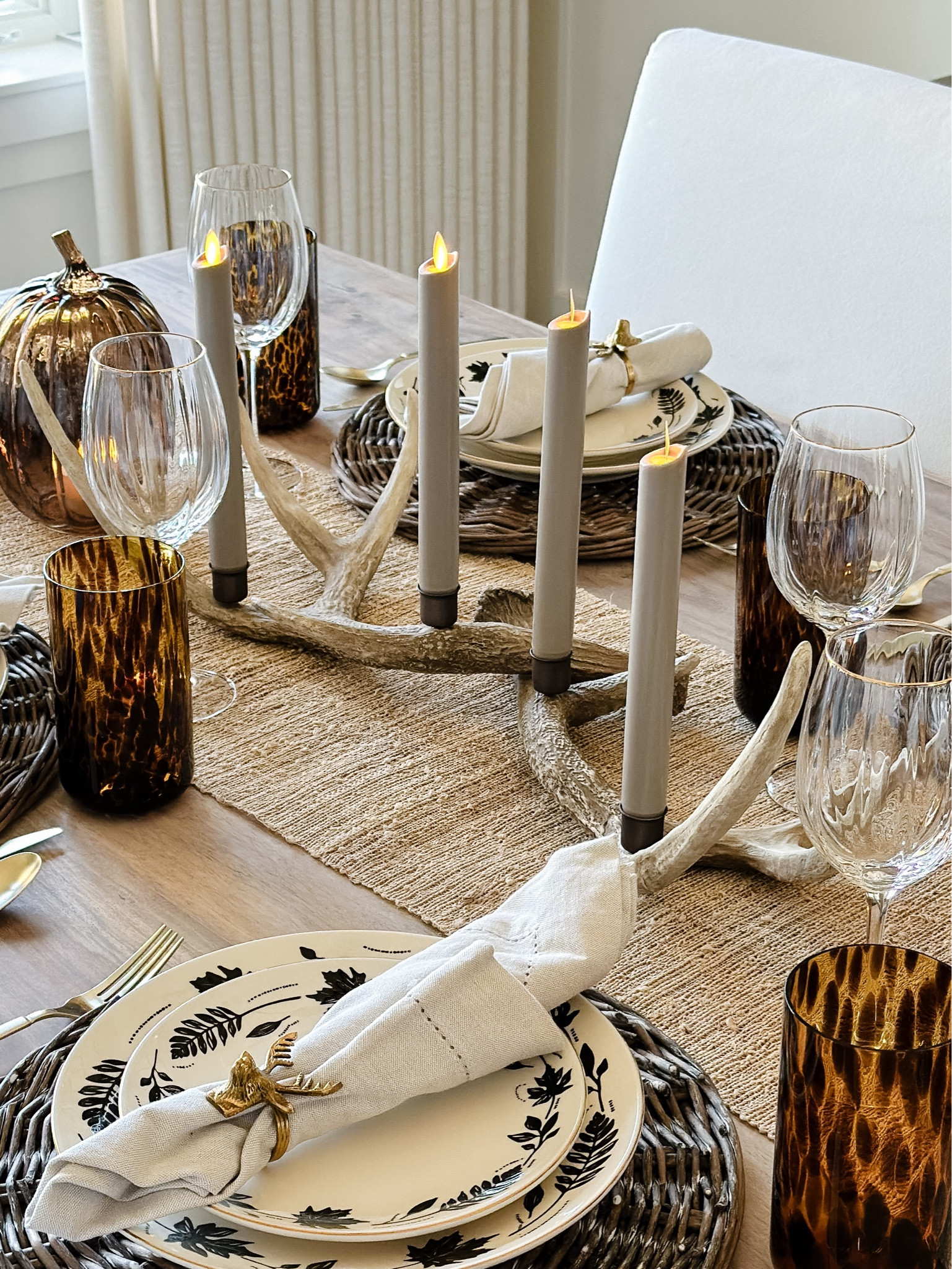 The most beautiful centerpiece for fall and holiday!  This faux antler centerpiece is absolutely gorgeous!  I paired it with my favorite flameless flickering flame taper candles.  You can also use it to style on a console table or mantle.  

#LTKSeasonal #LTKHome #LTKStyleTip