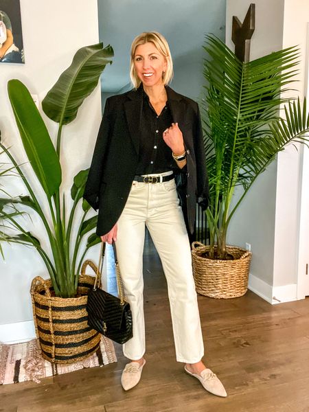 White pant outfit for spring! I love these cream, colored jeans, paired with a silk blouse, oversize blazer, mules, and handbag