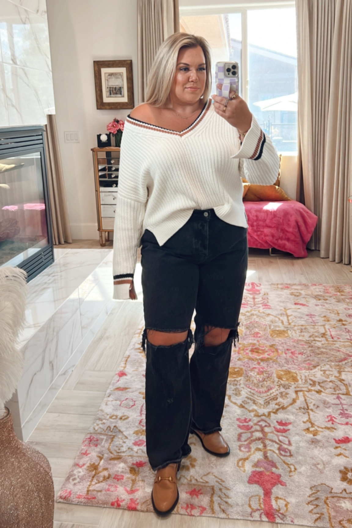 curvy fall sweater outfit! wearing size xl in varsity sweater and size 32 in black distressed denim 

#LTKcurves #LTKSeasonal #LTKunder100