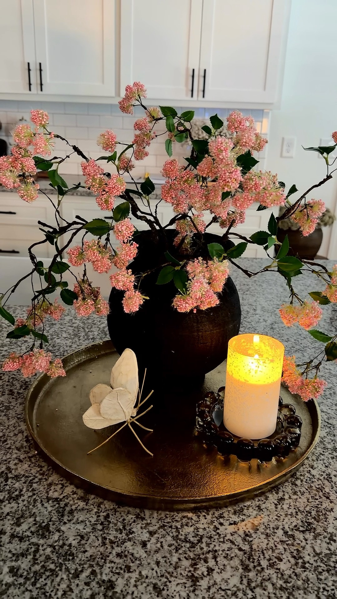 These stems bring the whimsy! I love the soft pink color. I kept this tray simple. I just added a beautiful frosted, flameless candle and topped it off with a sweet butterfly!