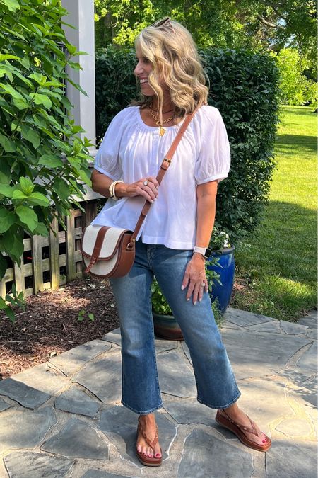 Denim and white! Always the answer when you  don’t know what to wear. 

These kick flare jeans from Madewell are so good. I am wearing 28P. 

#LTKOver40 #LTKStyleTip