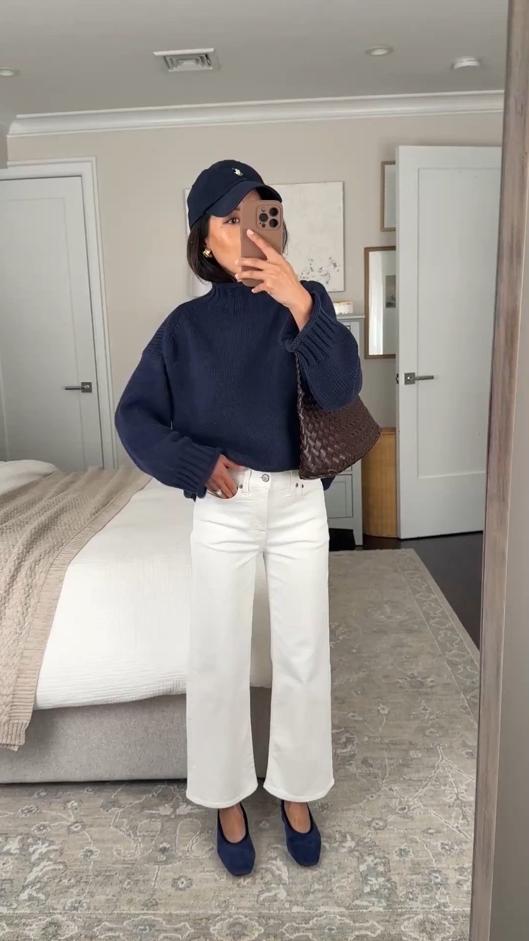 Classic chic mom outfit. 
• jeans are old jcrew but I have a very similar pair from Madewell that is off white (better for fall winter), on sale and fit great in 24 Short!

• Suede ballet flats 5.5 TTS so comfy with no breaking in needed. low stacked heel, supportive on the inside

• cotton sweater xxs, oversized relaxed fit with shorter length, thicker knit, can shrink a little bit in the dryer 

• Anthropologie woven shoulder bag with liner

• Polo hat

Easy mom outfit, petite friendly jeans, transitional spring workwear outfit, rollneck sweater, white jeans

#LTKWorkwear #LTKmomlife #LTKPetite
