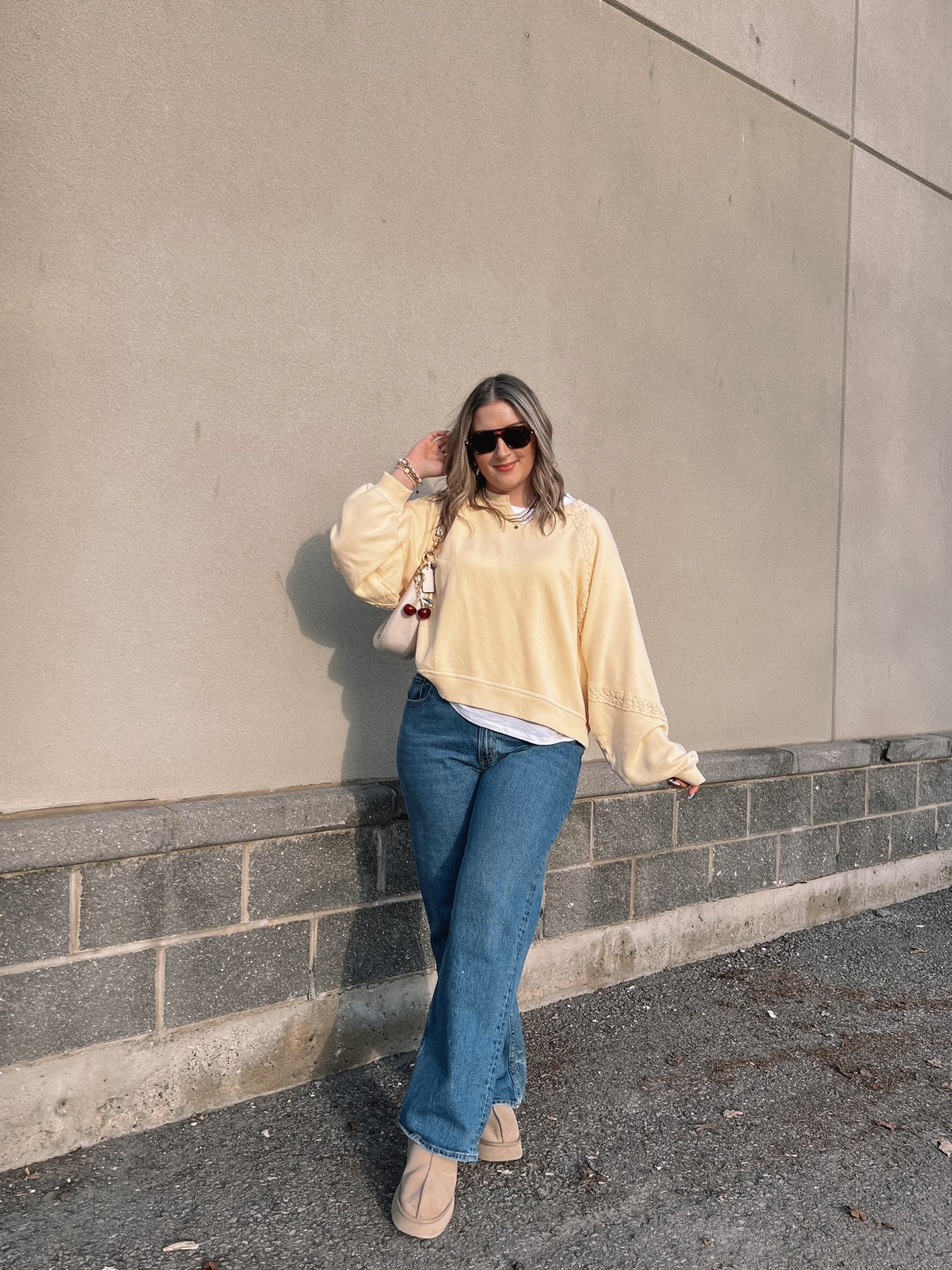 Spring outfit inspo from last year! Butter yellow sweatshirt is old from Aerie, linked similar in the same color. Wearing 32 in the jeans. Ugg Tazz platforms fit TTS

#LTKspring #LTKMidsize #LTKootd