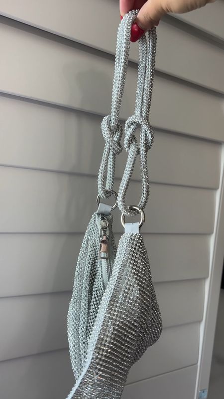 You guys!!! You need this handbag!!!! It’s a dupe for a designer bag but you can’t even tell the difference!!! It’s so sparkly, comes in tons of colors, also has a crossbody and it fits so much!! I also love the slouchy look! Perfect for going out, date night or going to a wedding! #bag #purse #handbag #weddingguest 

#LTKwedding #LTKunder50 #LTKstyletip