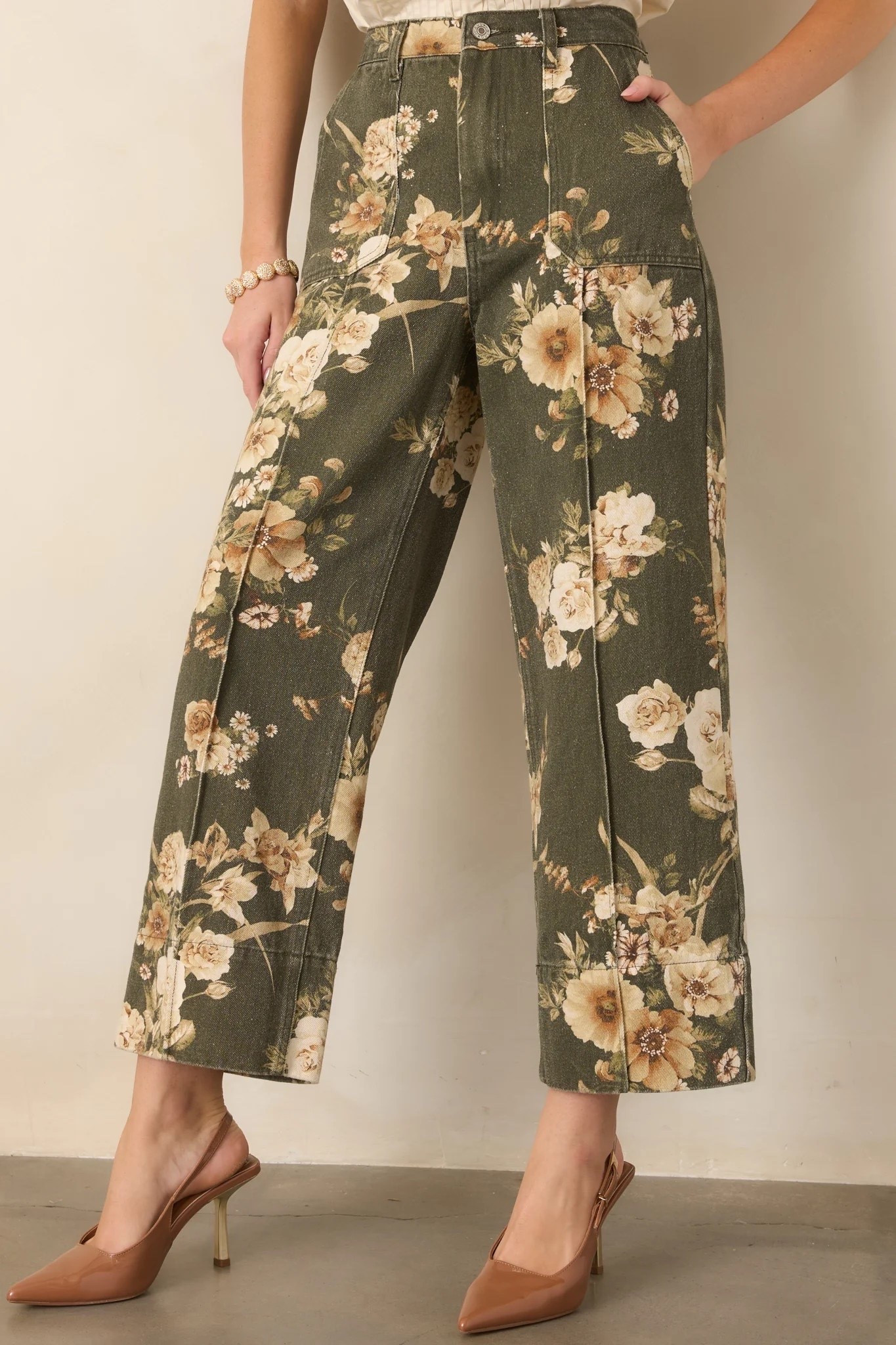 The Naturally Speaking Olive & Ivory Floral Cotton Wide-Leg Pants bring effortless, relaxed elegance to warm-weather dressing with their botanical-inspired floral print and breezy wide-leg silhouette. Perfect for vacation days, brunches, resort getaways, and elevated everyday looks. Under $80.

Ideas:

* floral wide-leg pants
* olive green fashion
* resort style
* vacation wardrobe
* elevated casual style

Keywords:

* floral pants
* wide leg pants
* floral wide leg pants
* cotton pants
* olive green pants
* printed pants
* summer pants
* vacation outfits
* resort wear
* beach vacation outfits
* casual summer outfits
* wide leg trousers
* women’s pants
* boho fashion
* summer fashion

#LTKgrwm #LTKTravel #LTKWorkwear