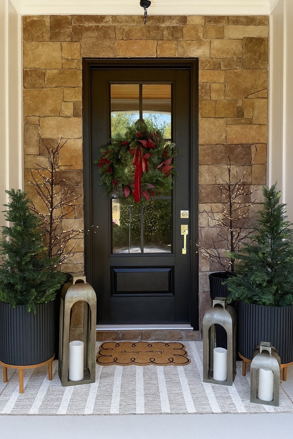 I’m loving this year’s Christmas porch! These lit trees from Amazon are so magical at night! I’ve linked a very similar version of our wreath below under “similar”. I’m using last years Threshold wreath 🫶🏻

#LTKHoliday #LTKHome #LTKSeasonal