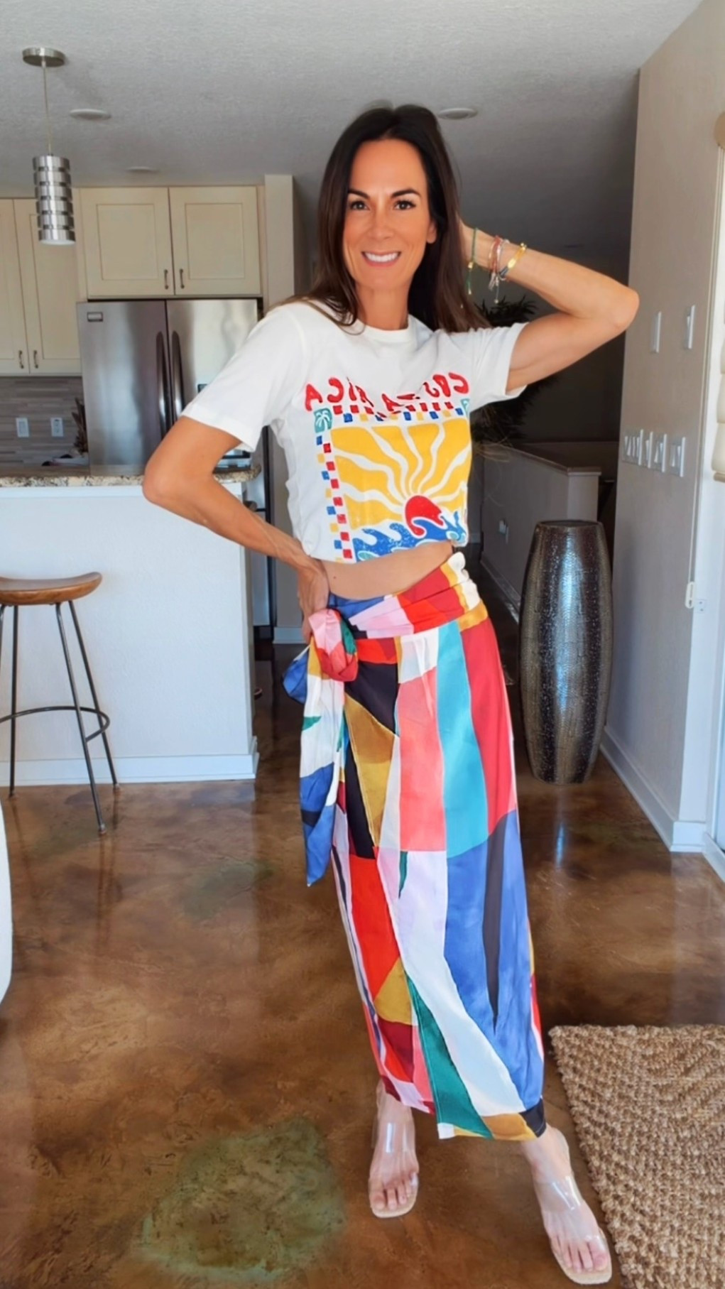 Color therapy but make it fashion 🌈✨
This silky wrap skirt + casual tee combo is giving “vacation energy with zero effort” and honestly… I’m obsessed. The bold colors, the flowy fit, the easy vibe — this is the kind of outfit that instantly puts me in a good mood 💃☀️

Proof that a simple tee and a statement skirt can absolutely steal the show. Paired it with oversized sunnies and a straw tote for the ultimate chic-but-fun summer look 🤍

And use code NICOLECOLEE35 for 35% off your order!

#ColorfulStyle #VacationStyle #SummerOOTD #ChicCasualStyle #NicoleColeeStyle

#LTKdayinmylife #LTKgrwm #LTKootd