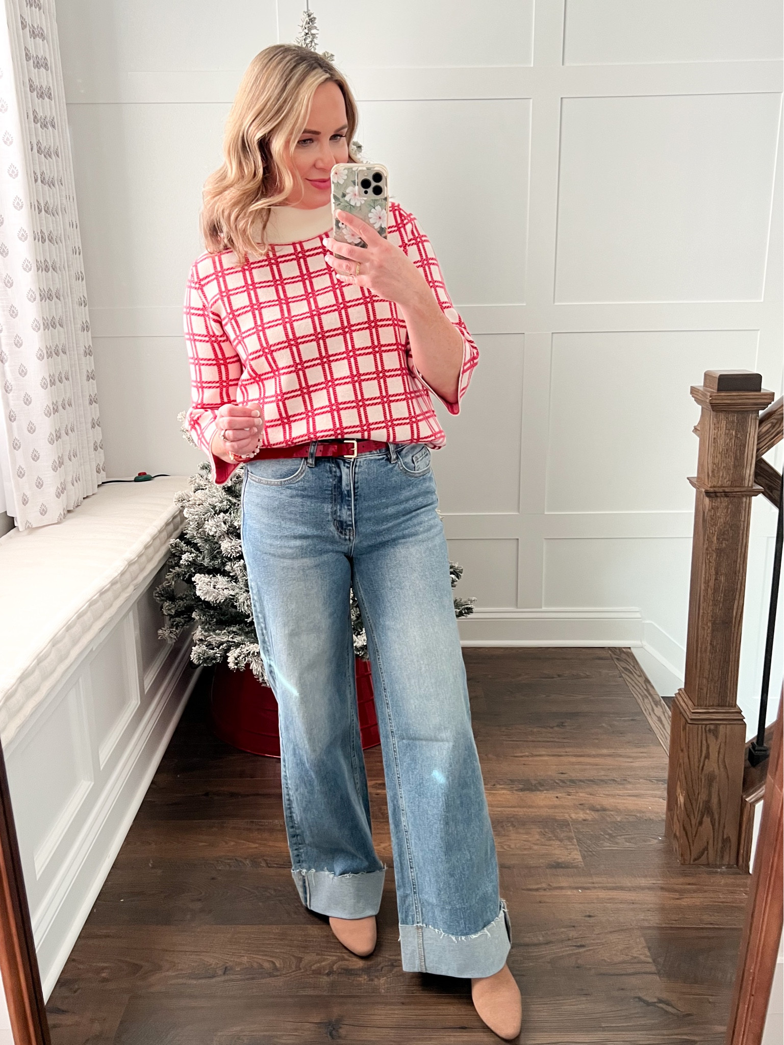 Both the sweater and jeans run a little big. If in-between sizes, size down. Wearing a small in the sweater  

#LTKOver40 #LTKHoliday