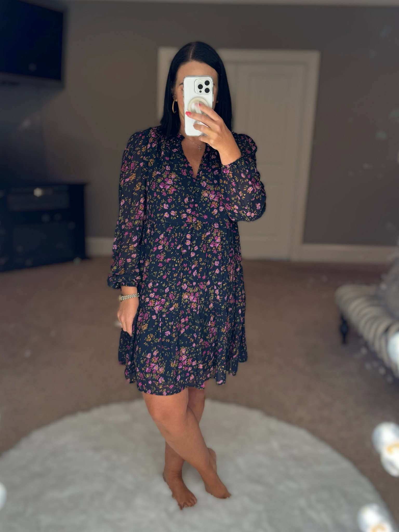 Floral is still in style as we head into fall. This chiffon overlay dress features a sheer sleeve, v-neck with faux  buttons. The light weight fabric is great for those warmer early fall days with sandals and boots when the weather turns cooler. Wearing a small  

#LTKWorkwear #LTKStyleTip