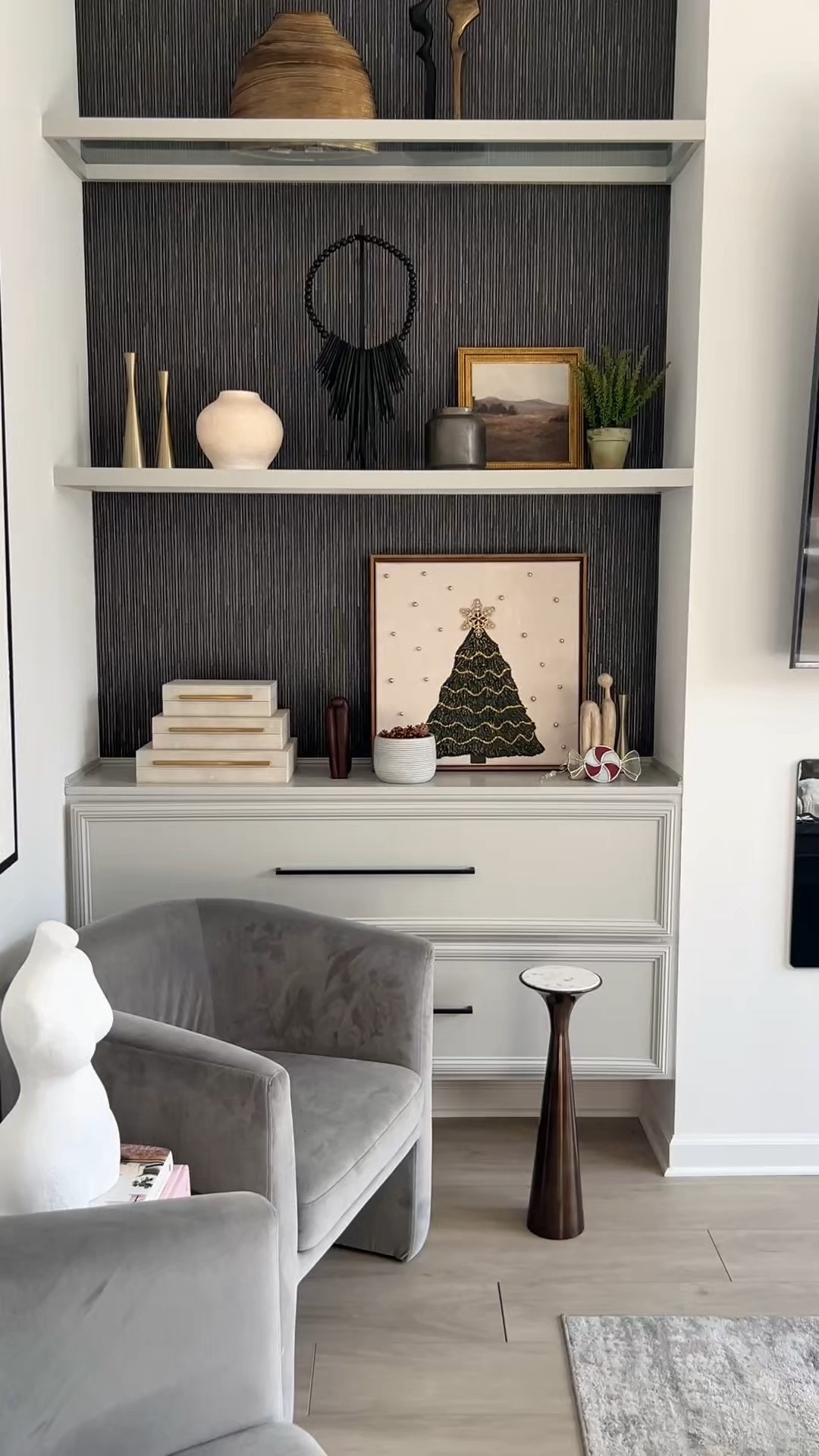 This is the piece that finished the shelf for me.

Styling my shelf with decor and the textured Christmas tree art I made — especially once it’s lit.

#LTKHome