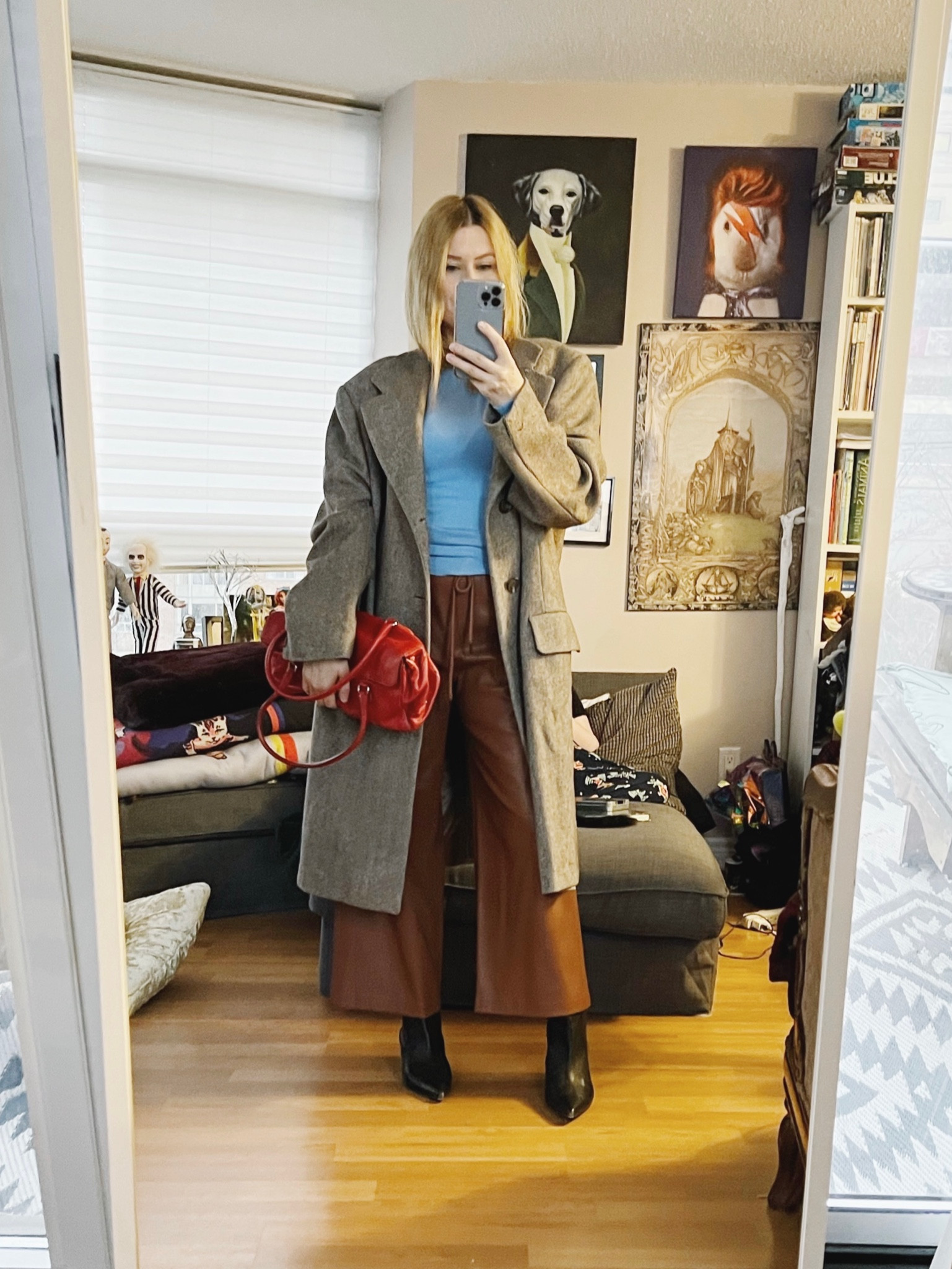 It’s so dark on here today. I think I need to get a lamp or something. On overcast days it’s like a cave.
To keep discussing last photos explanation of using your adjectives and modifiers when buying things and getting dressed I’ll discuss how it works here. The chill is the stretchy knit longsleeve, wide leg trousers, and the oversized proportion of the coat. The classic is black, pointy toe boots, a long menswear inspired coat, and leather trousers. Versatile comes in with the different ways and pairings I use with these pieces, and then my modifier is the colour combination of cognac, light blue, and red. 
But the thing is that I didn’t think about those things when I was getting dressed. I just grabbed them and knew they would work because the intention behind why I bought them. It needs to check those boxes before you bring it home, that way it will work with whatever else is in your wardrobe because they were purchased with the same personal style thought process. 
•
.  #FallLook  #StyleOver40  #menswearInspired  #vintageCoat #prada  #vintagePrada #secondhandFind #FashionOver40  #MumStyle #genX #genXStyle #genXInfluencer #WhoWhatWearing #genXblogger #cos #secondhandDesigner #Over40Style #40PlusStyle #Stylish40s  #HighStreetFashion #StyleIdeas


#LTKunder100 #LTKstyletip #LTKSeasonal