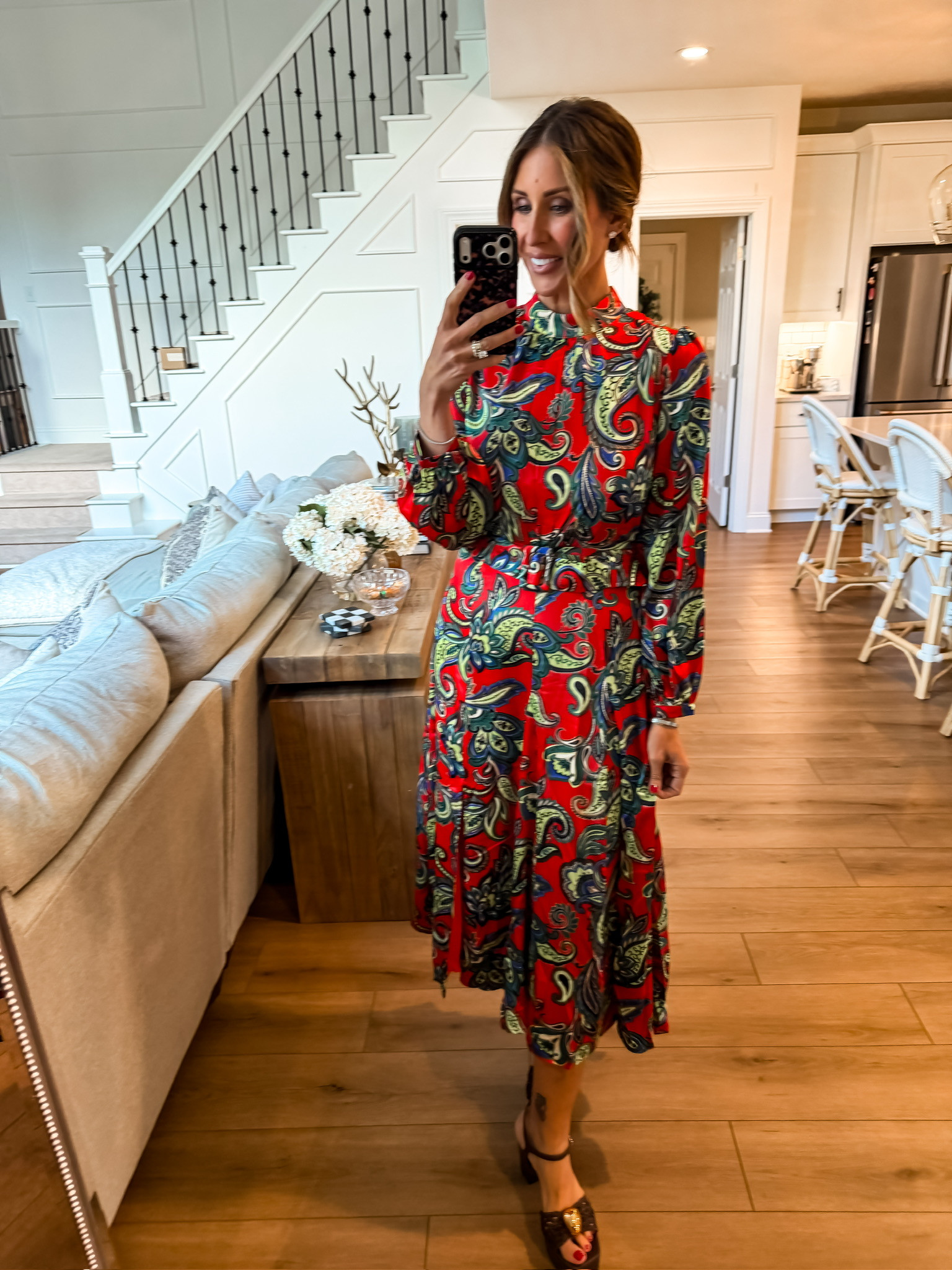 This paisley midi dress brings ALL the color for fall. I love the bold red with olive and navy tones, and the belted waist gives the flowy silhouette just enough shape. Add heels or boots and it’s ready for dinner, work or a fall event.

paisley dress, fall midi dress, red fall dress, belted dress, fall event outfit, fall workwear, colorful fall outfit, long sleeve dress, fall date night dress, women’s fall fashion, statement dress, themominstyle

#LTKootd #LTKOver40 #LTKSeasonal