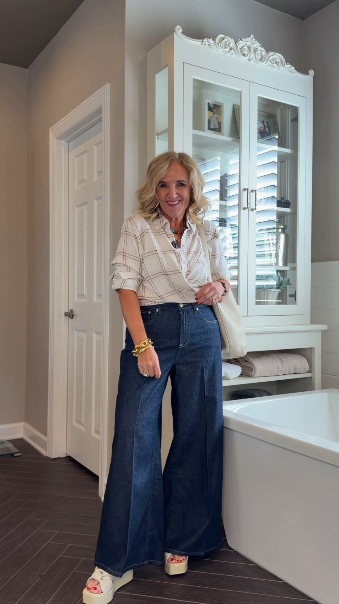Spanx lightweight wide leg jeans size medium petite 
Criss cross tuck works with blouses that run a little big or long.
My exact blouse is sold out, but I’ve linked several similar

#LTKOver40 #LTKPetite #LTKootd