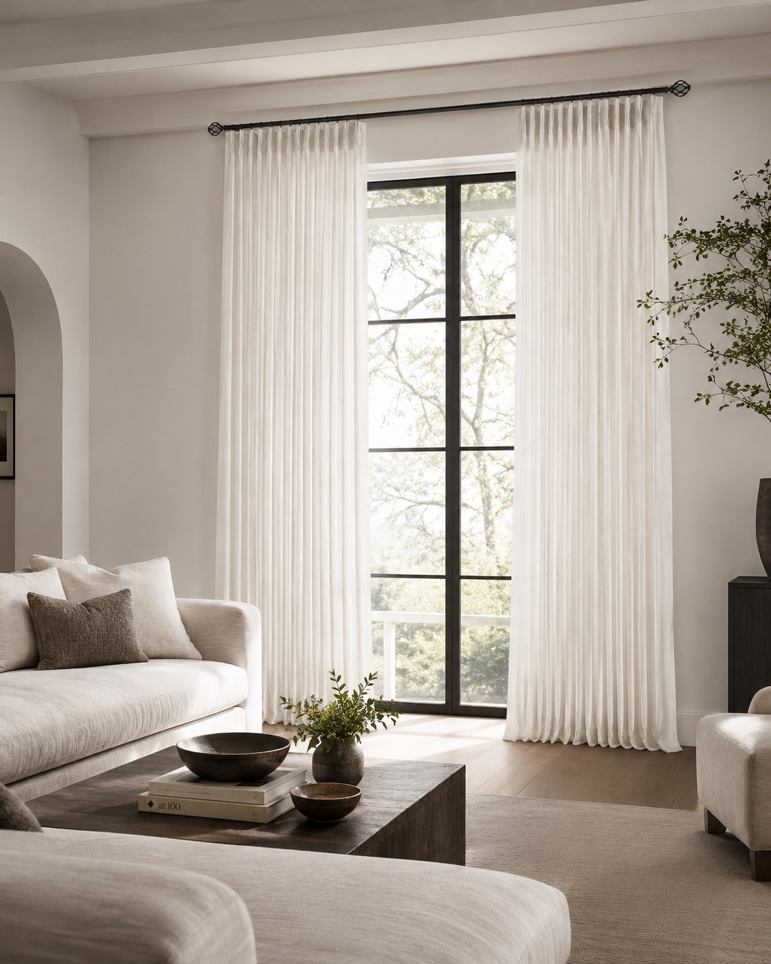 The perfect drapes! These are the ones I recommend to my design clients! Style tip- black curtain rods for the win. Pinch pleat, neutral aesthetic and on trend! This laser level is a sanity saver for hanging curtain rods, art, tile and molding! 
Curtains, beige, ivory, cream, black curtain rod, organic modern, transitional, minimalist, Restoration Hardware style, sofa, olive tree, arch mirror, coffee table, Wayfair home, Amazon home

#LTKhome #LTKsale #LTKstyletip