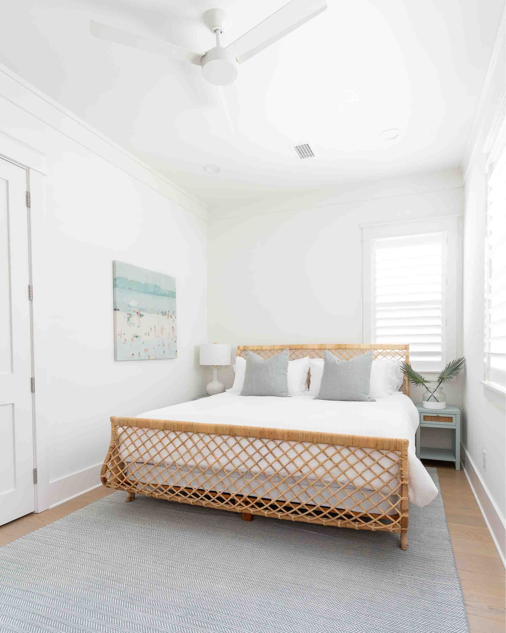 Our Florida carriage house bedroom featuring a rattan bed frame, Swedish blue herringbone rug, white waffle knit bedding, light blue and cane nightstands, beach art, white ceramic lamps, and faux palm leaves. Take the full tour here: https://lifeonvirginiastreet.com/our-florida-carriage-house-tour/
.
#ltkhome #ltkseasonal #ltkfindsunder50 #ltkfindunder100 #ltkstyletip #ltkover40 #ltktravel coastal bedroom decor, Serena & Lily style, neutral bedroom decor


#LTKSeasonal #LTKsalealert #LTKhome