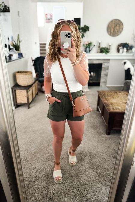 How to style a white lace top, with a double lined crop top underneath, olive green linen shorts, brown crossbody bag and platform sandals. 

// Summer outfits 2024, summer dresses, floral summer dress, wedding guest dress, mom outfit ideas, summer outfit amazon, Amazon outfit ideas, casual outfit ideas, spring outfit inspo, casual fashion, amazon summer fashion, amazon casual outfit, cute casual outfit, outfit inspo, outfits amazon, outfit ideas, amazon shoes, Amazon bag, purse, size 4-6, casual summer outfits, casual outfit ideas everyday, summer fashion #ltkfindsunder100 

#LTKStyleTip #LTKShoeCrush #LTKFindsUnder50