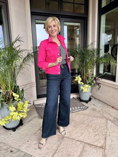 
Palazzo pants are your most classic wardrobe staple. Their loose cut flatters women of all ages, regardless of your body shape. I love how the fabric swirls around as you walk, making you look graceful and put together. 🤩

I have paired mine from @frame with a classic striped tank top from @talbots and this gorgeous pink denim jacket. 
I’m dressing mine up by adding these block heels from @amazon 


#LTKOver40 #LTKSeasonal