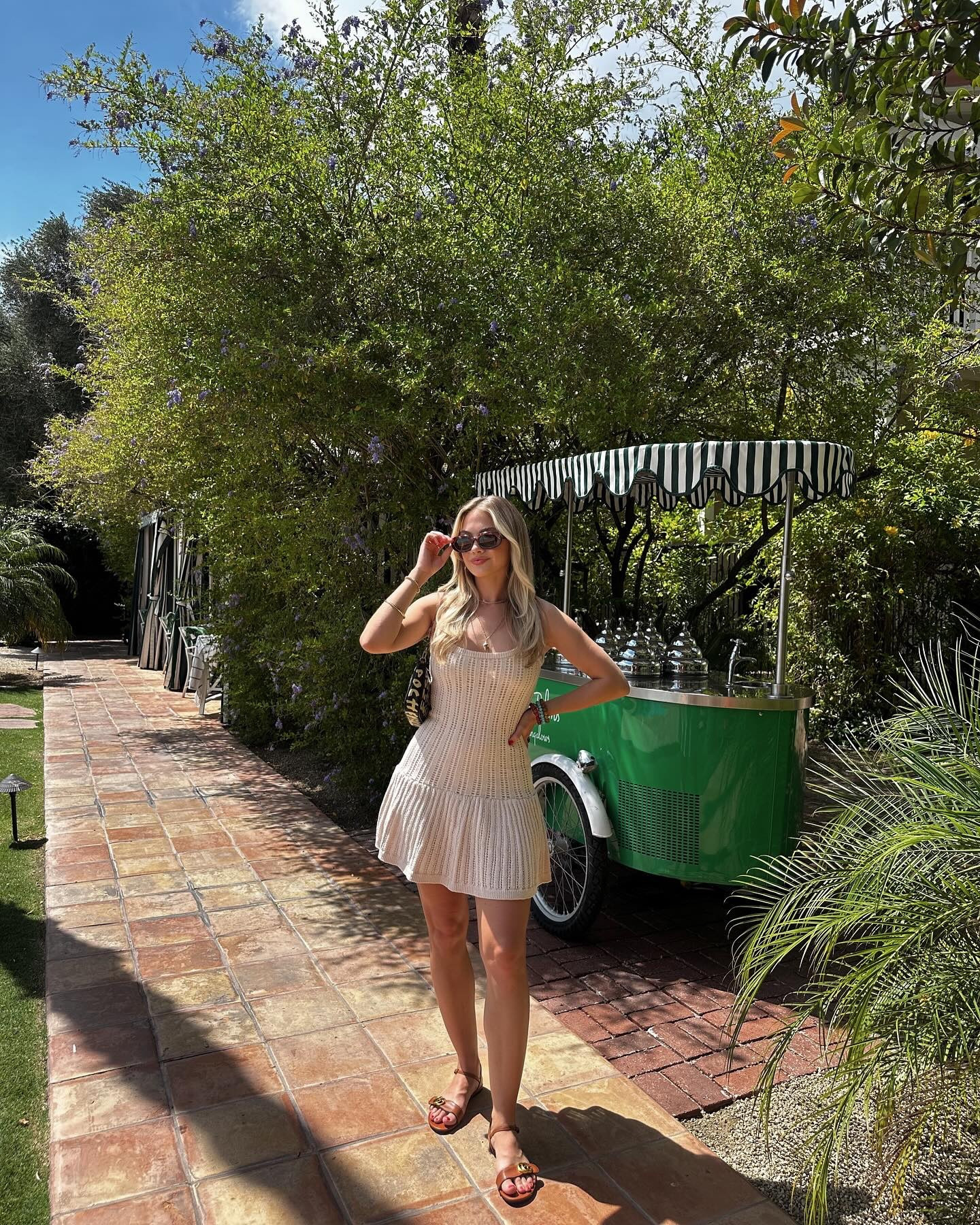 My happy place has palm trees and wine 🌴 @colonypalmshotel 

Dress available in the cream color on brand website. Www.dhnewyork.com • use my code LINDSAY10

One more week here in Palm desert 🌺 with my parents before I’m heading back to London. 

For outfit details head to my LTK IT page, you can find in my bio 🔗  I just got this dress and I already know I’ll be wearing it all summer. 💕