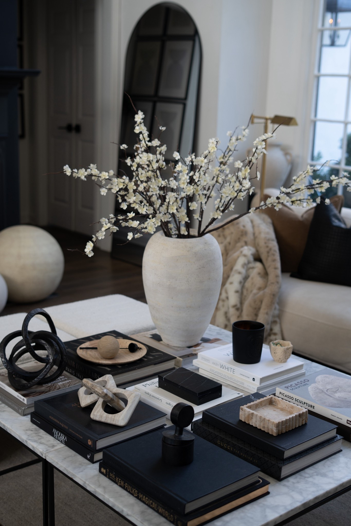 Guys! I’m freaking out because we sold these cherry blossoms out last year and they are finally back in stock! They are soooo beautiful and look sooo real! I loved styling them up on the coffee table with a rustic urn… and, of course, a pile of books & a mix of matte black brought in through the candle, glossy black brought in through the marble box…

Then we juxtaposed sharp black against rough and tumbled marble in soft hues with the trays (omg they are just sooo good!!) and a chain. 

The mix of soft blossoms, rough textures, glossy marble, iron, and clay. I’m DYING!! It’s sooo good! 

Love you guys and hope you leave feeling inspired to grab some cherry blossoms and create pure magic in your home, too!! XxV 



#LTKmomlife #LTKootd #LTKHome