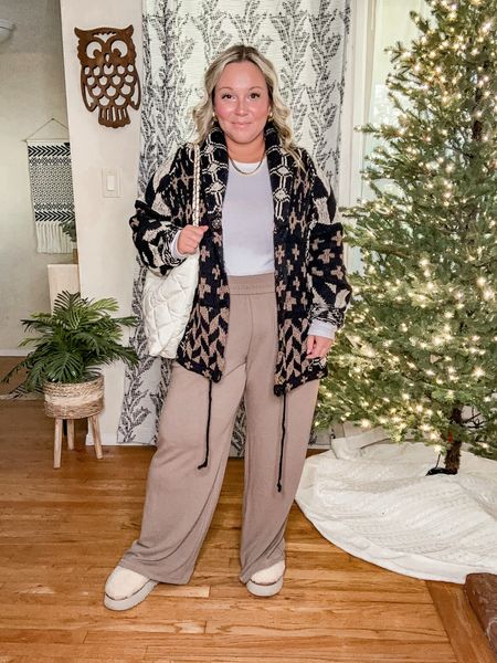 Midsize Thanksgiving outfit 
Casual outfit 
Free People sweater cardigan size small size down 1-2 sizes it’s oversized but so soft and high quality! 
White layering tee size XL super soft and comfy 
Lounge wide leg pants size large I need a medium they run big also super soft! 


#LTKover40 #LTKmidsize #LTKCyberWeek