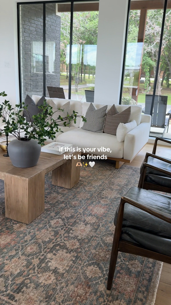 This is the living room that holds it all—conversation, comfort, and a whole lot of…