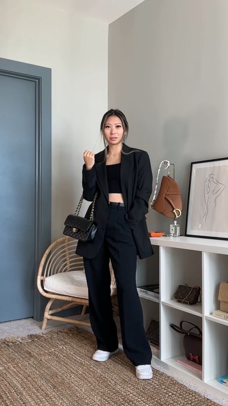 all black winter outfit // outfit deatils: oversized blazer - aritzia*, cropped ribbed tank - aritzia*, faux leather wide leg pants - aritzia*, sneakers - nike, bag - chanel* // *alternative options linked // minimalist style, neutral outfits, casual chic, parisian style

#LTKHoliday #LTKunder100 #LTKstyletip